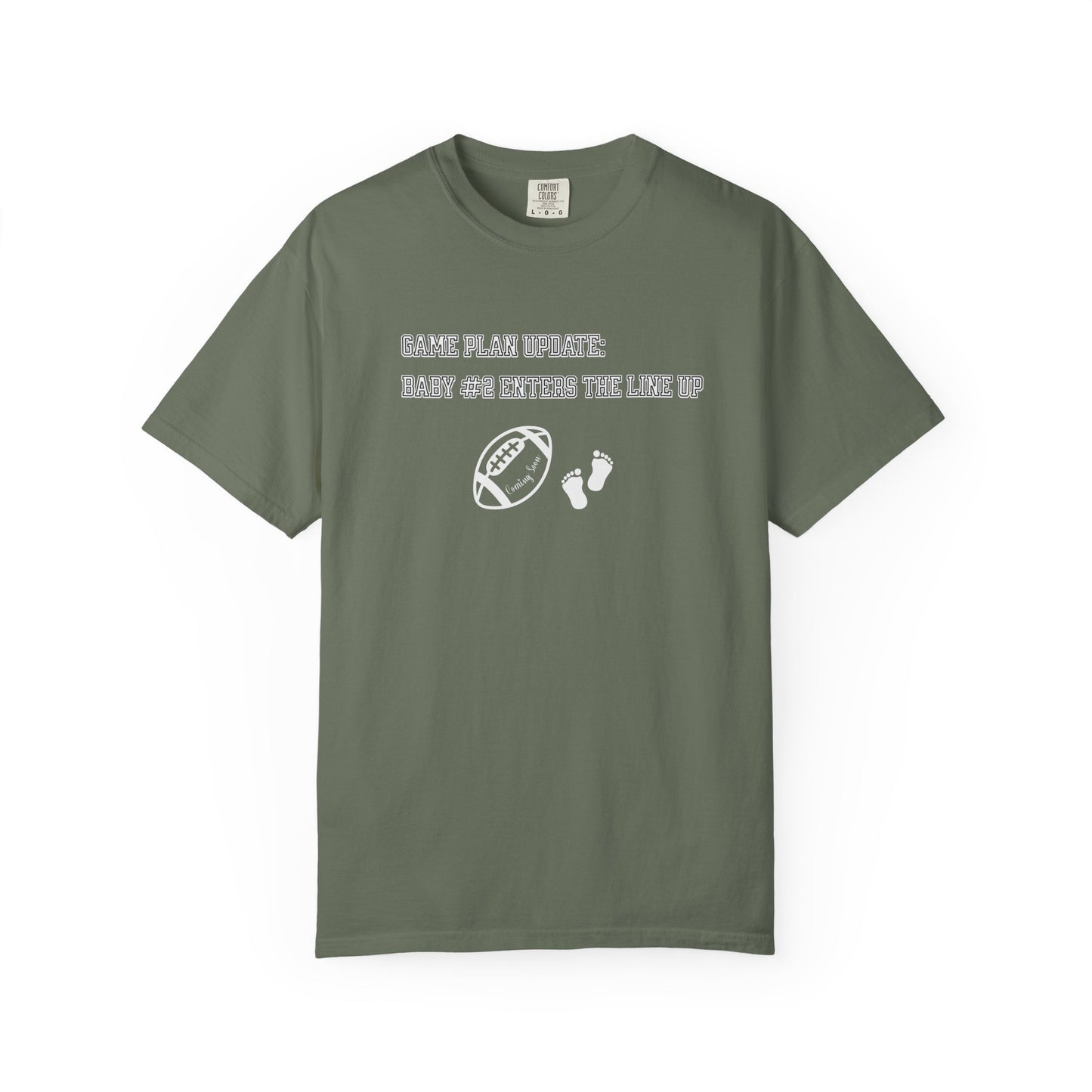 Green t-shirt with text and graphics on a white background