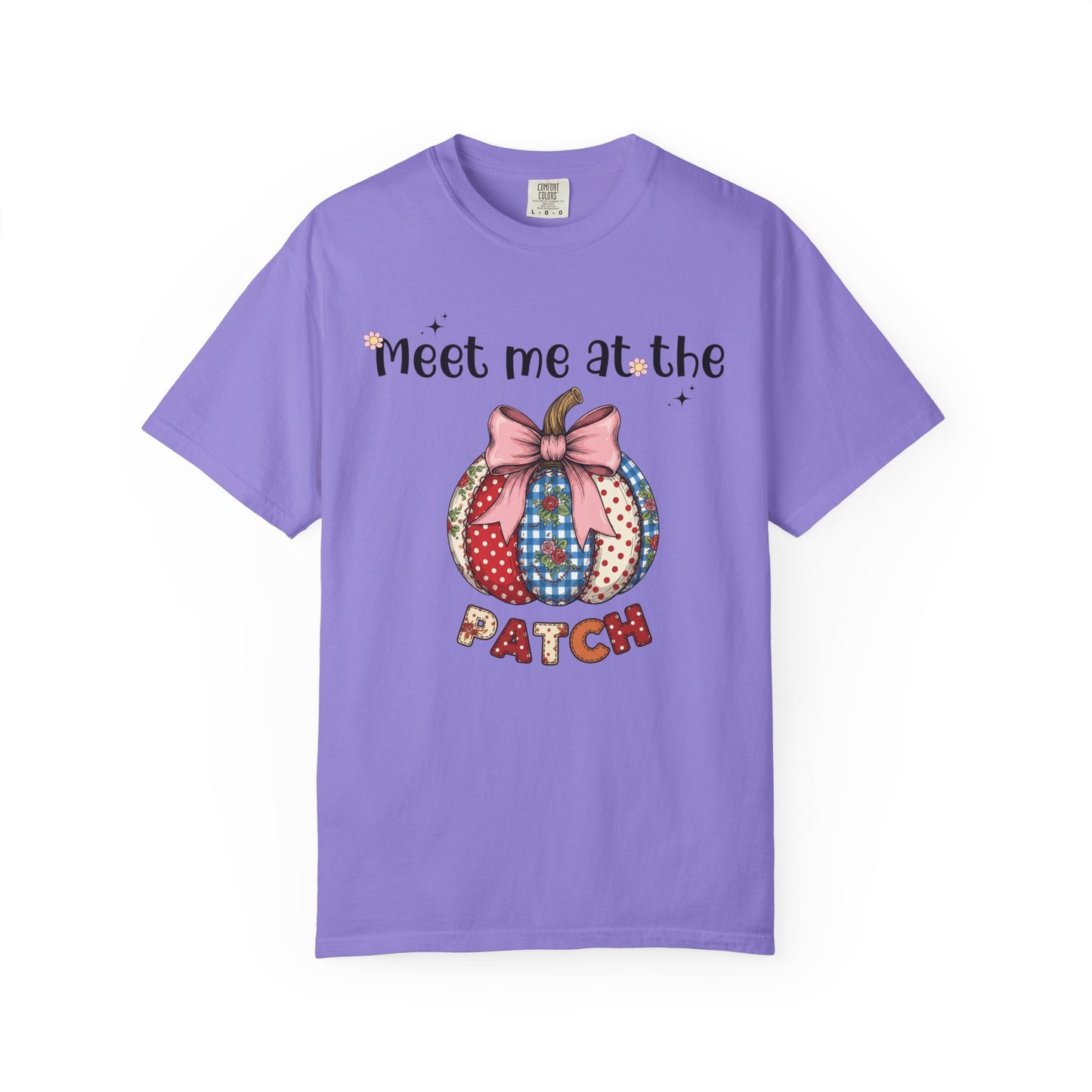 Purple t-shirt with a colorful pumpkin design and text on a white background