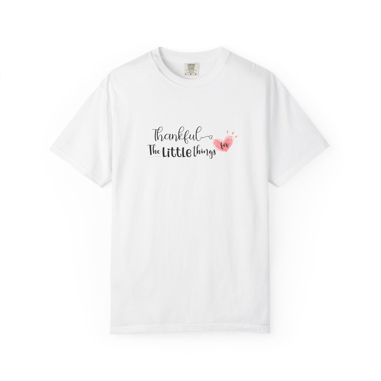 White t-shirt with 'Thankful for the little things' text and heart design on a white background
