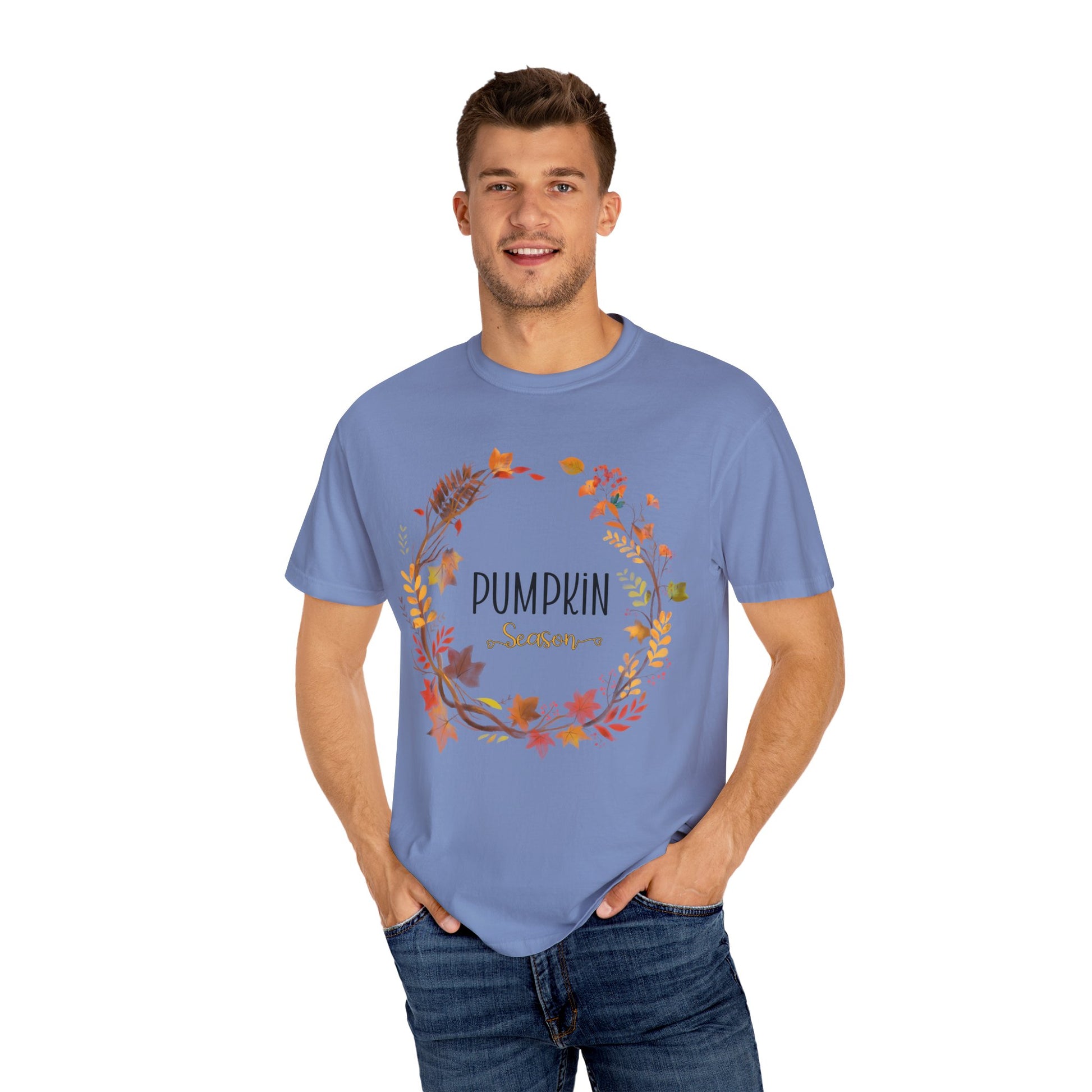 Man wearing a blue t-shirt with 'PUMPKIN' design on a white background