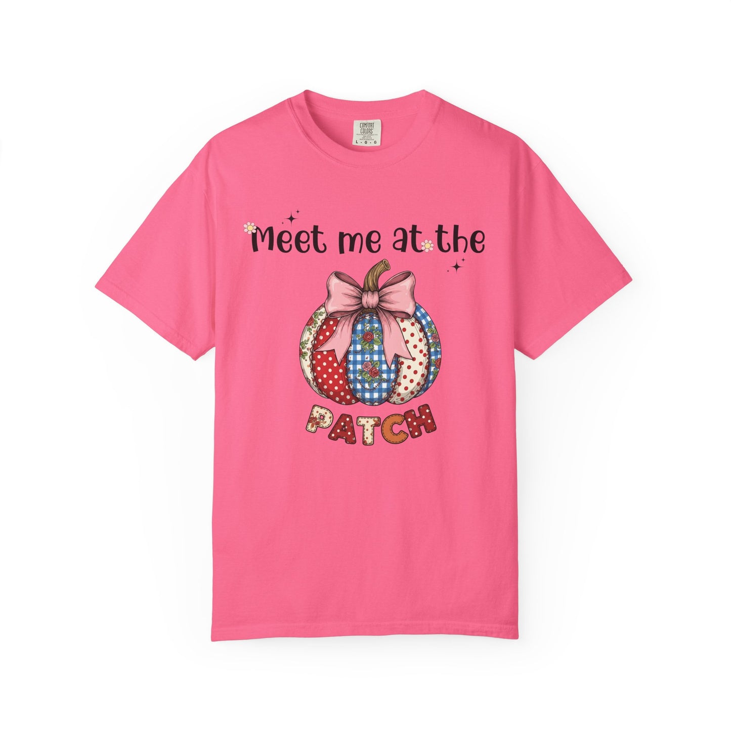 Pink t-shirt with a graphic design and text on a white background