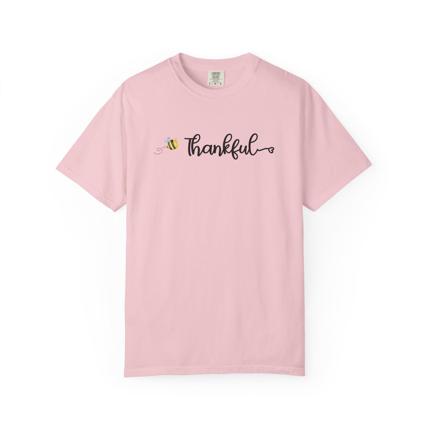 Pink t-shirt with 'Thankful' text and bee graphic on a white background