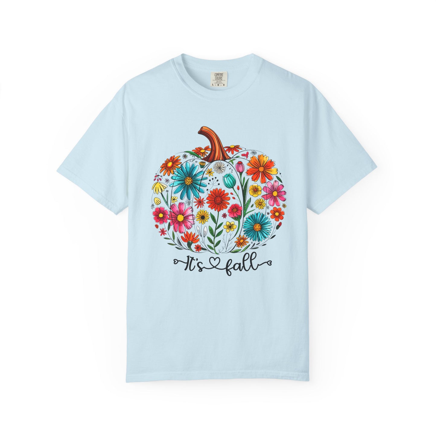 Light blue t-shirt with a colorful pumpkin design and 'It's fall' text on a white background
