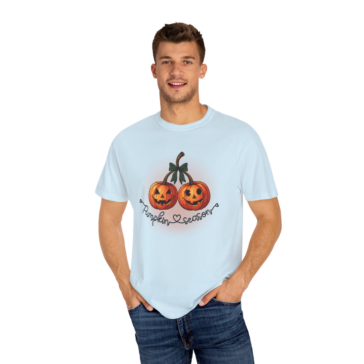 Man wearing a light blue t-shirt with Halloween-themed design on a white background