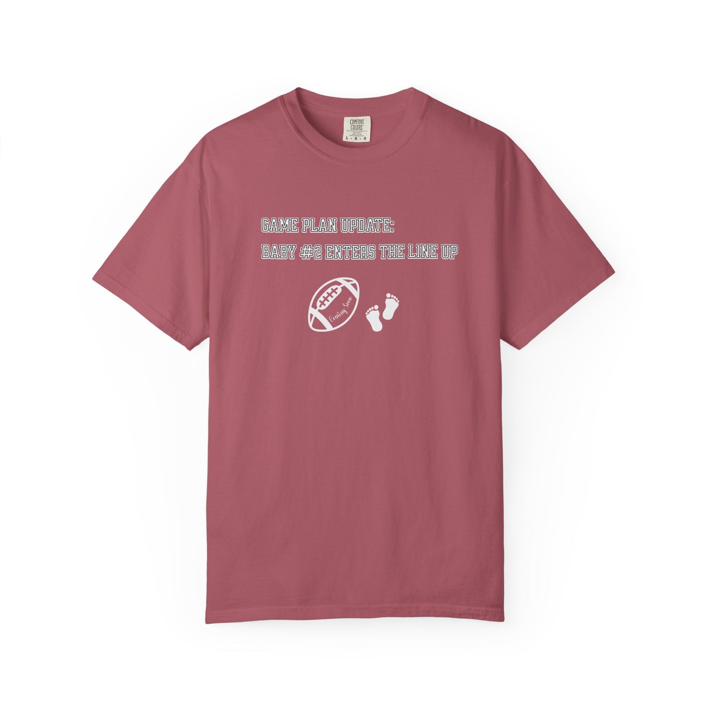 Maroon t-shirt with white text and graphics on a white background