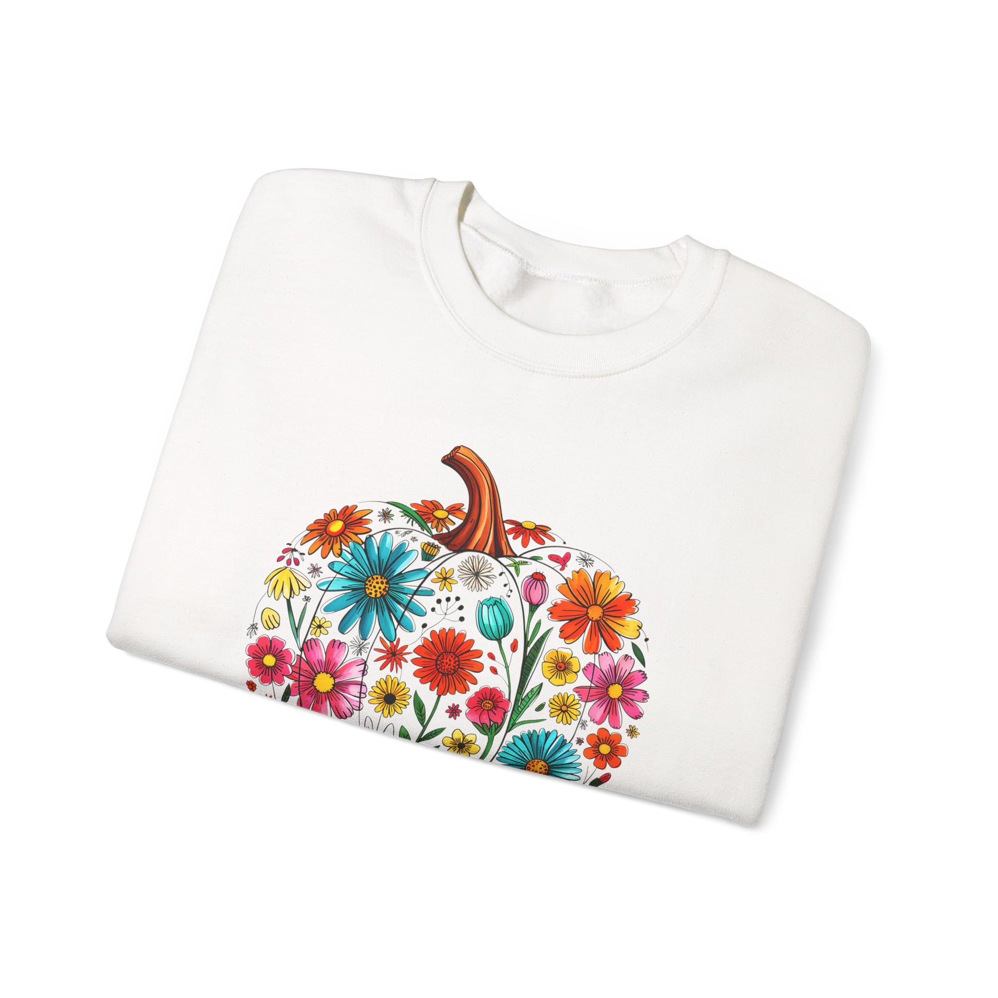 White shirt with a colorful floral pumpkin design on a white background