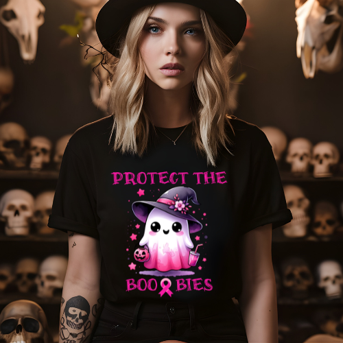 Woman wearing a black t-shirt with a pink ghost graphic and text in a room with skulls.