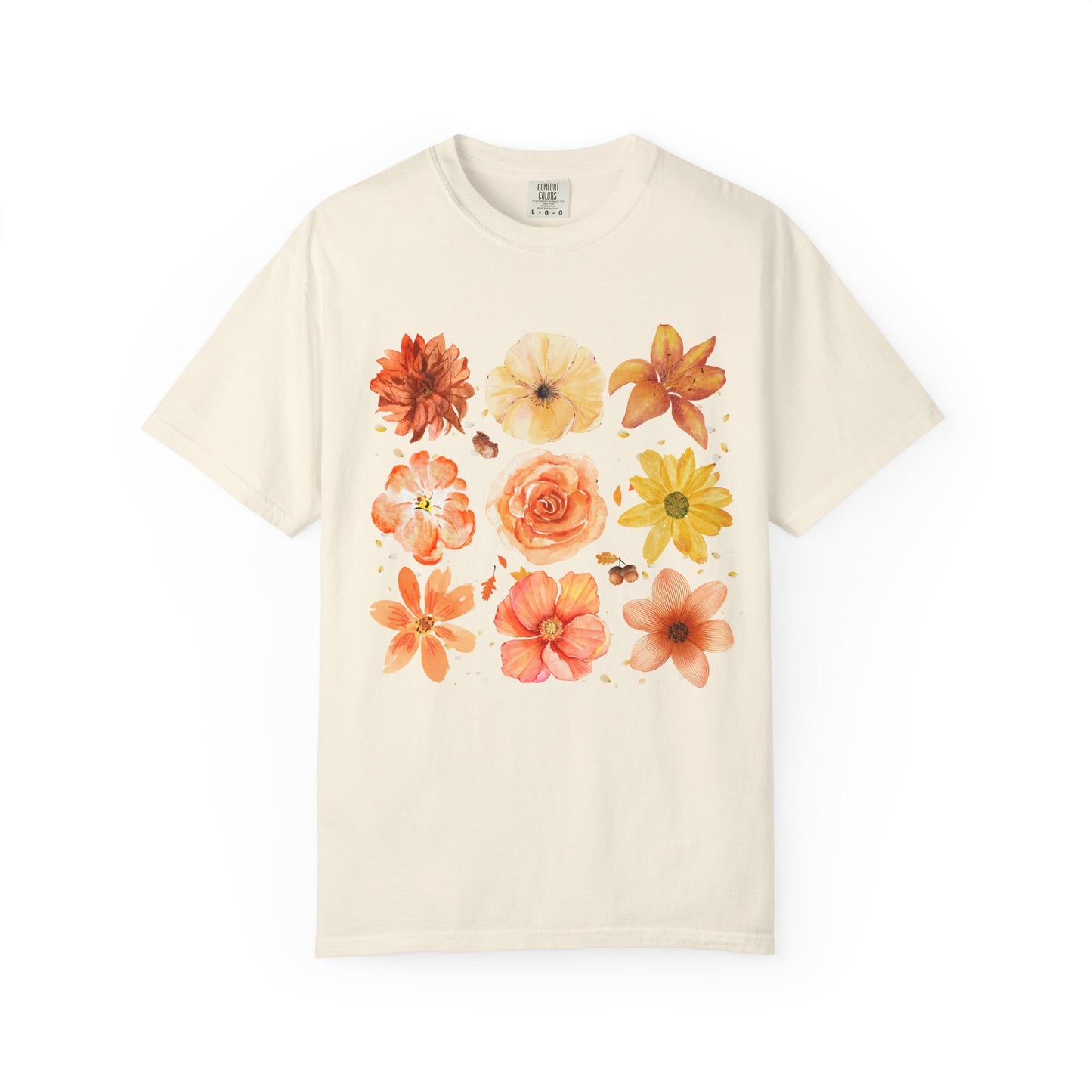Beige t-shirt with floral designs on a white background