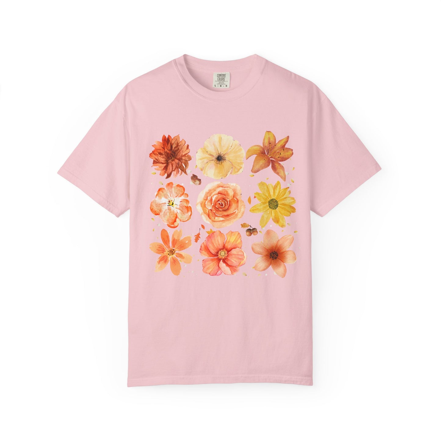 Pink t-shirt with floral designs on a white background