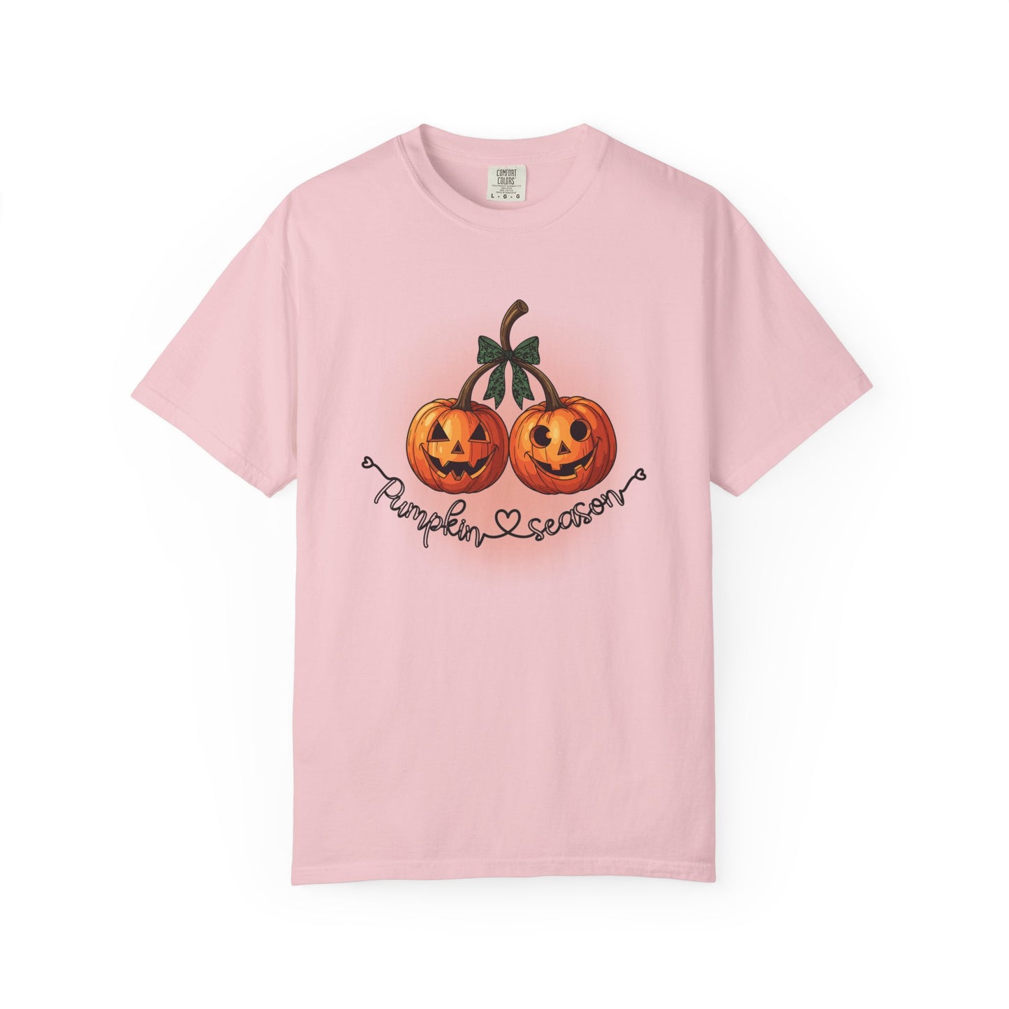 Pink t-shirt with pumpkin design and 'Pumpkin Season' text on a white background