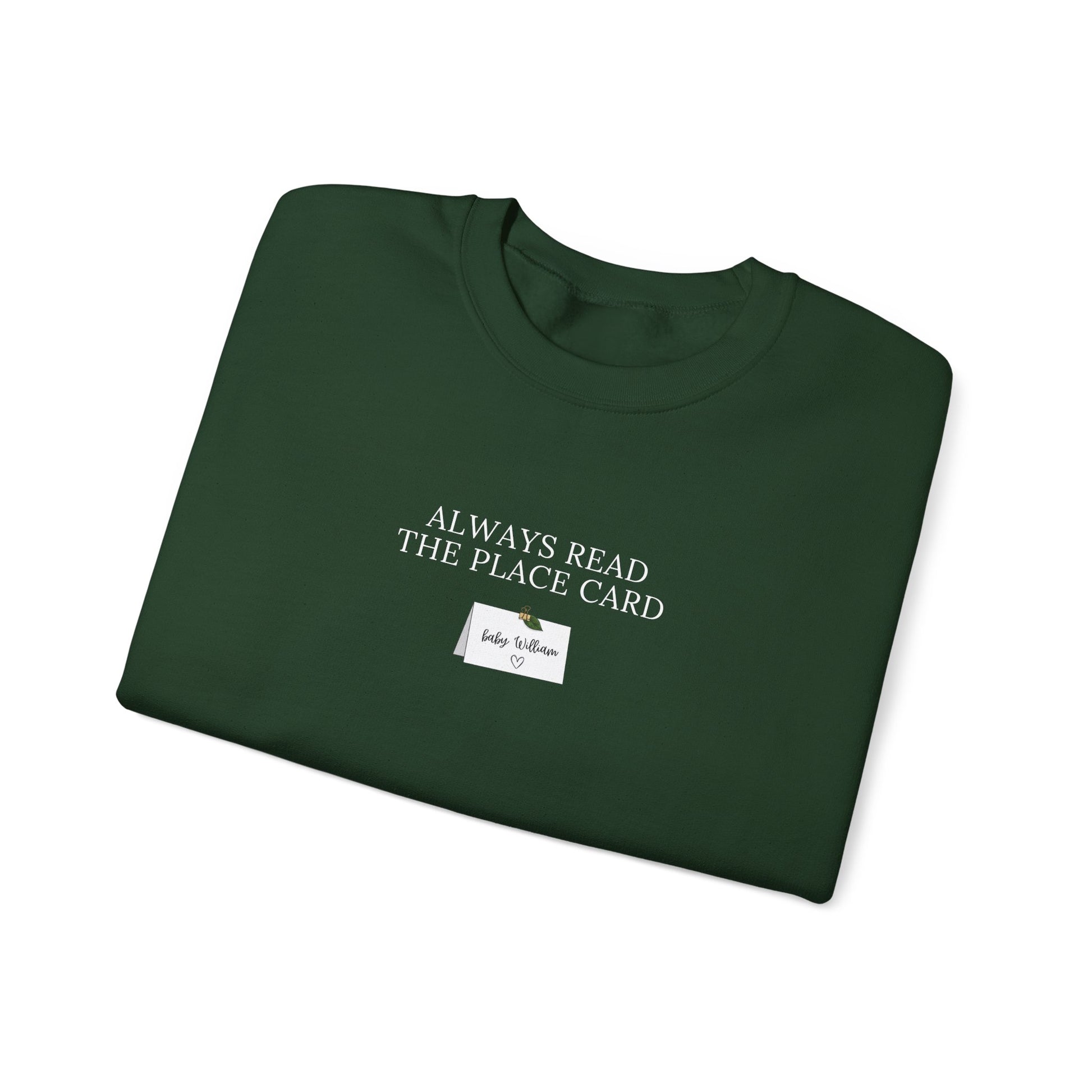 Folded green sweatshirt with text on a white background