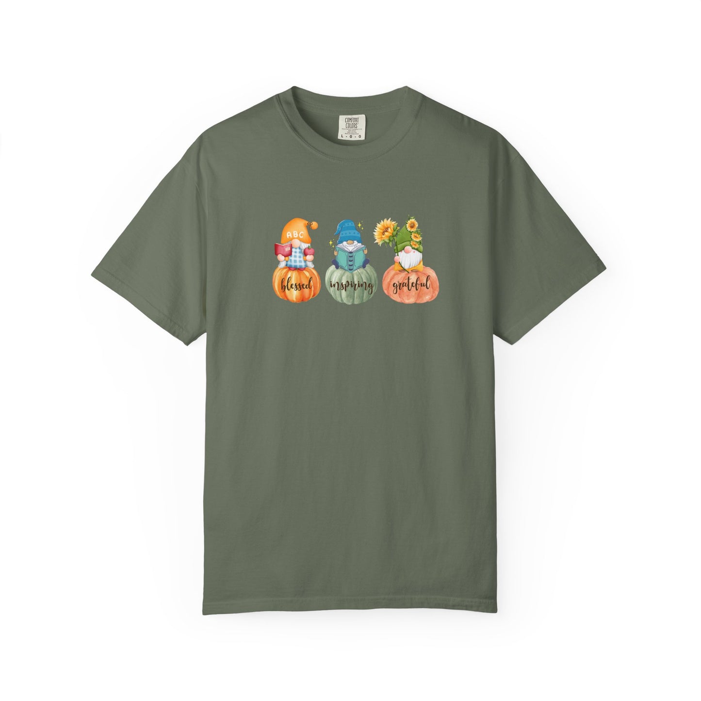 Green t-shirt with three gnomes in pumpkins design on a white background
