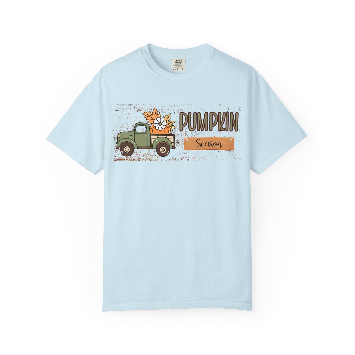 Light blue t-shirt with a graphic of a truck and 'Pumpkin Season' text on a white background