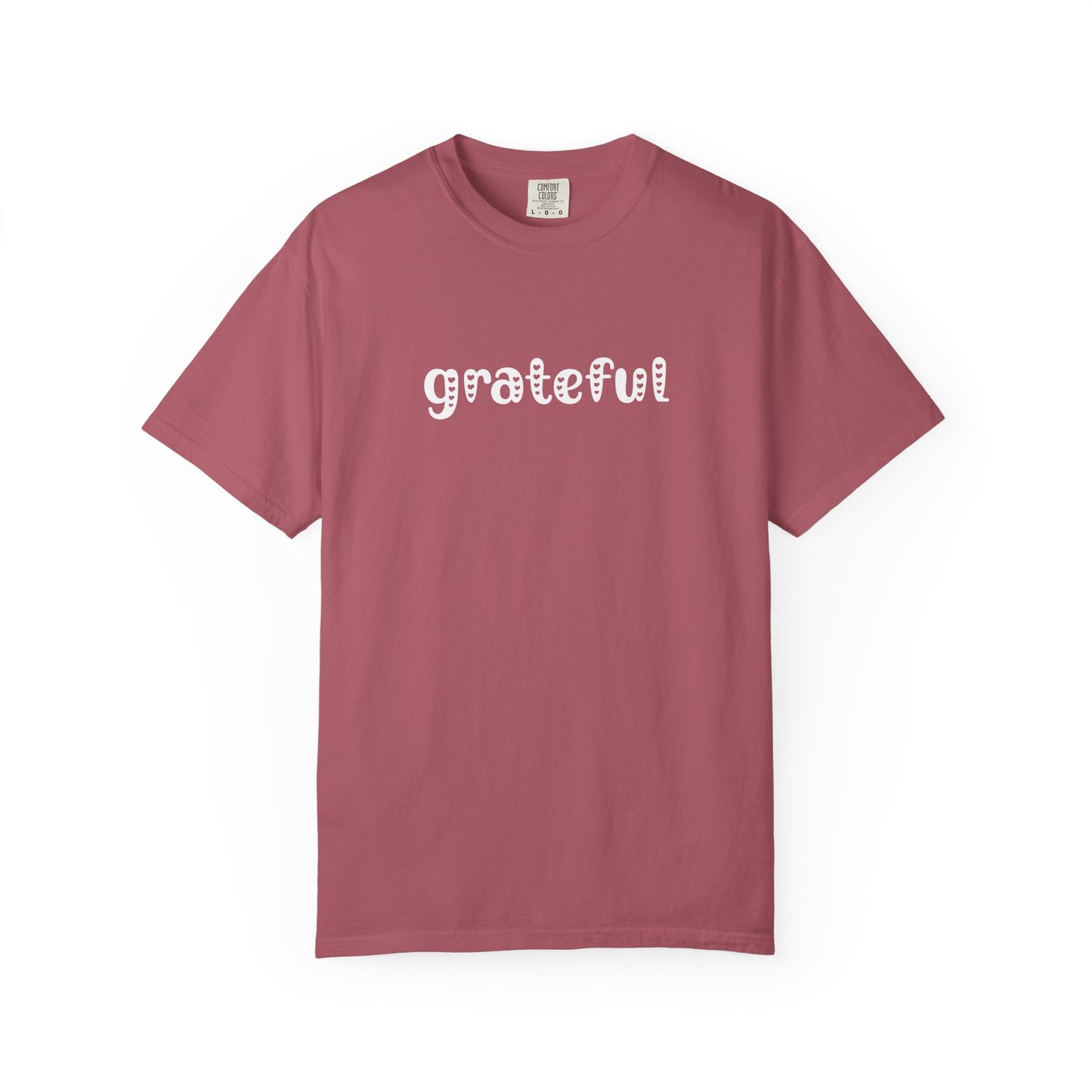 Mauve t-shirt with 'grateful' text on a white background