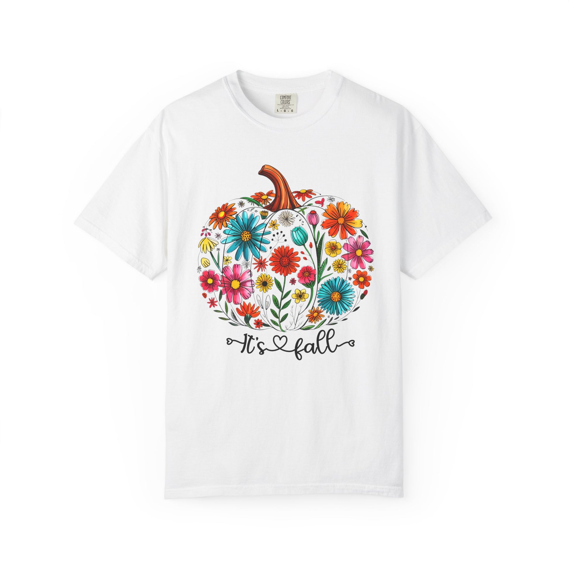 White t-shirt with a colorful pumpkin design and 'It's Fall' text on a white background