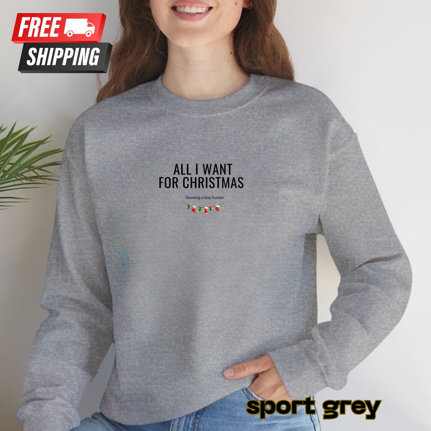 Person wearing a gray sweatshirt with text, standing against a plain background with 'Free Shipping' label.