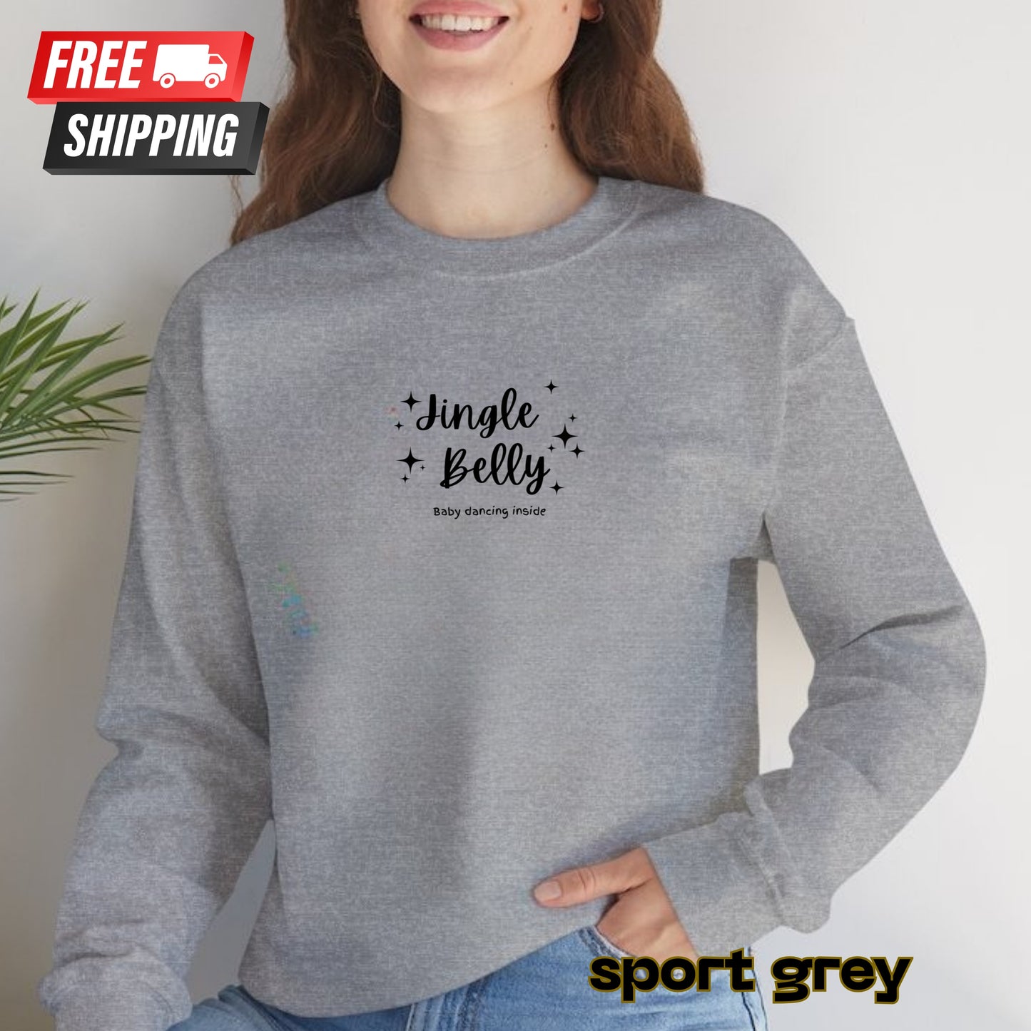 Person wearing a gray sweatshirt with 'Jingle Belly' text, standing against a plain background.