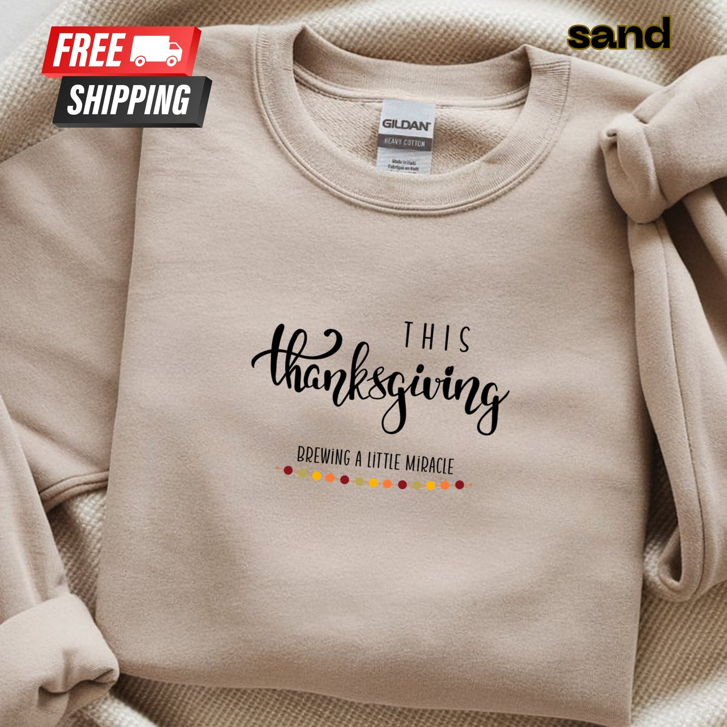 Beige sweatshirt with 'This Thanksgiving brewing a little miracle' text and Gildan label.