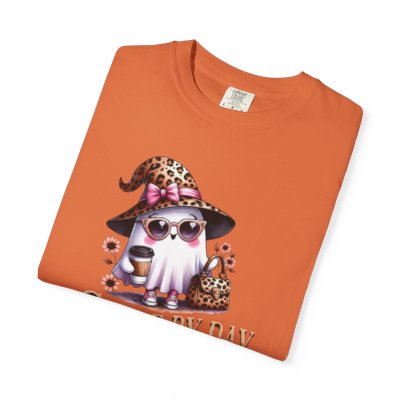 Orange t-shirt with a cute graphic of a cat in a witch hat, sunglasses, and holding a coffee cup.
