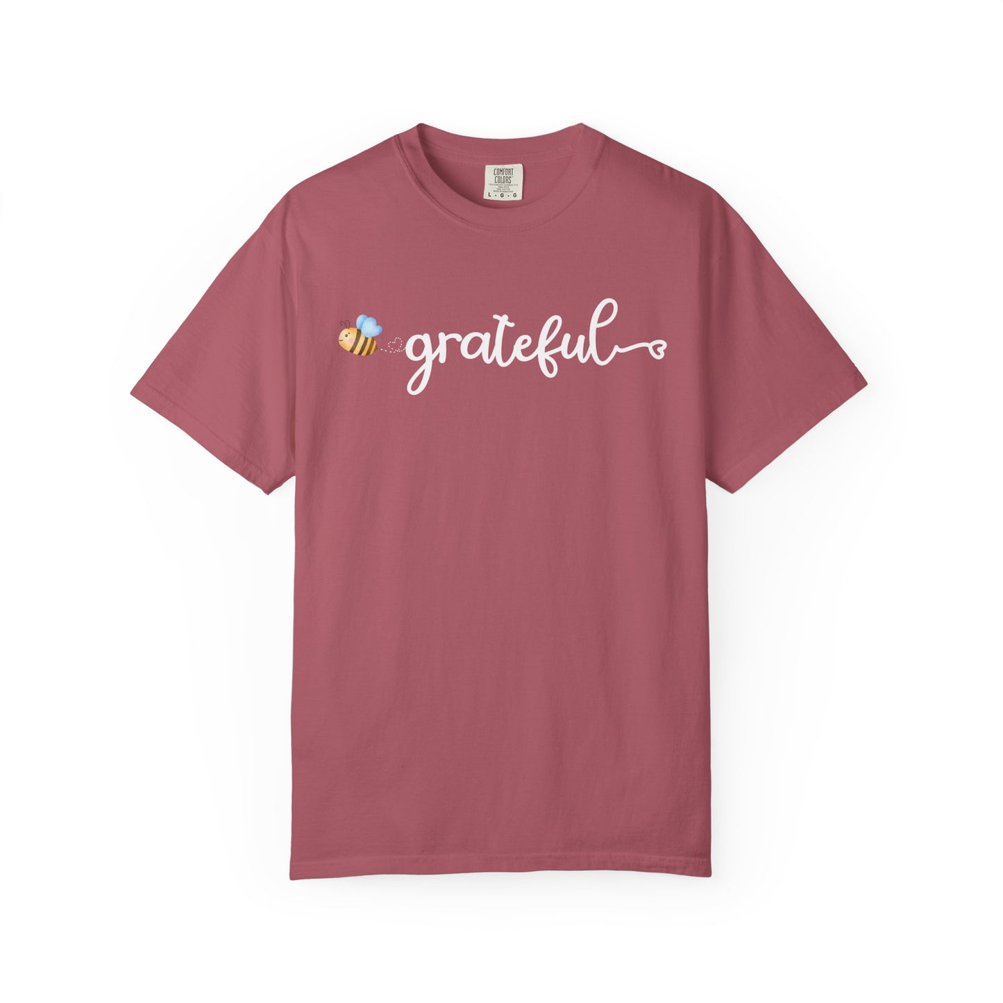 Mauve t-shirt with 'grateful' text and bee graphic on a white background