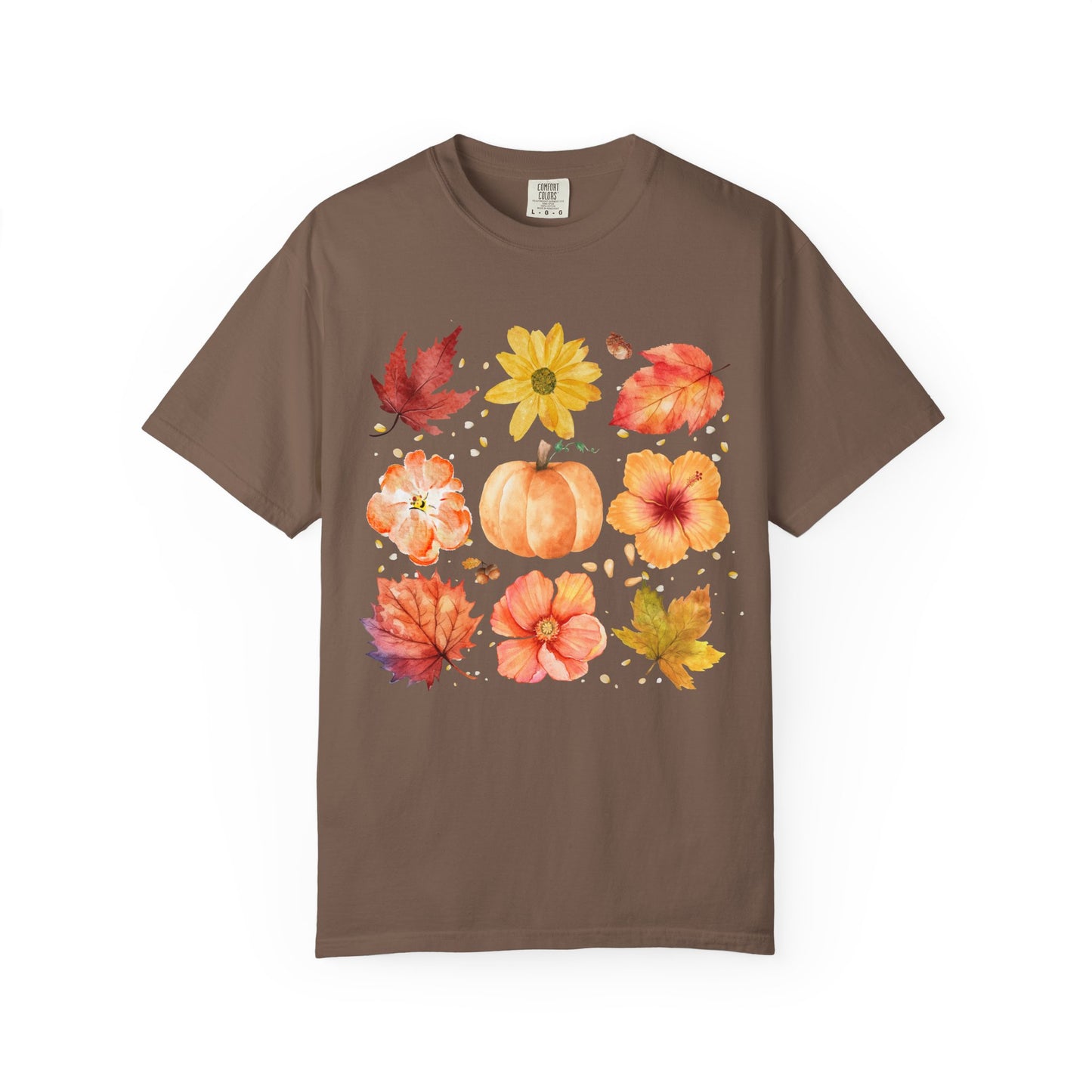 Brown t-shirt with autumn-themed design featuring leaves and pumpkins on a white background