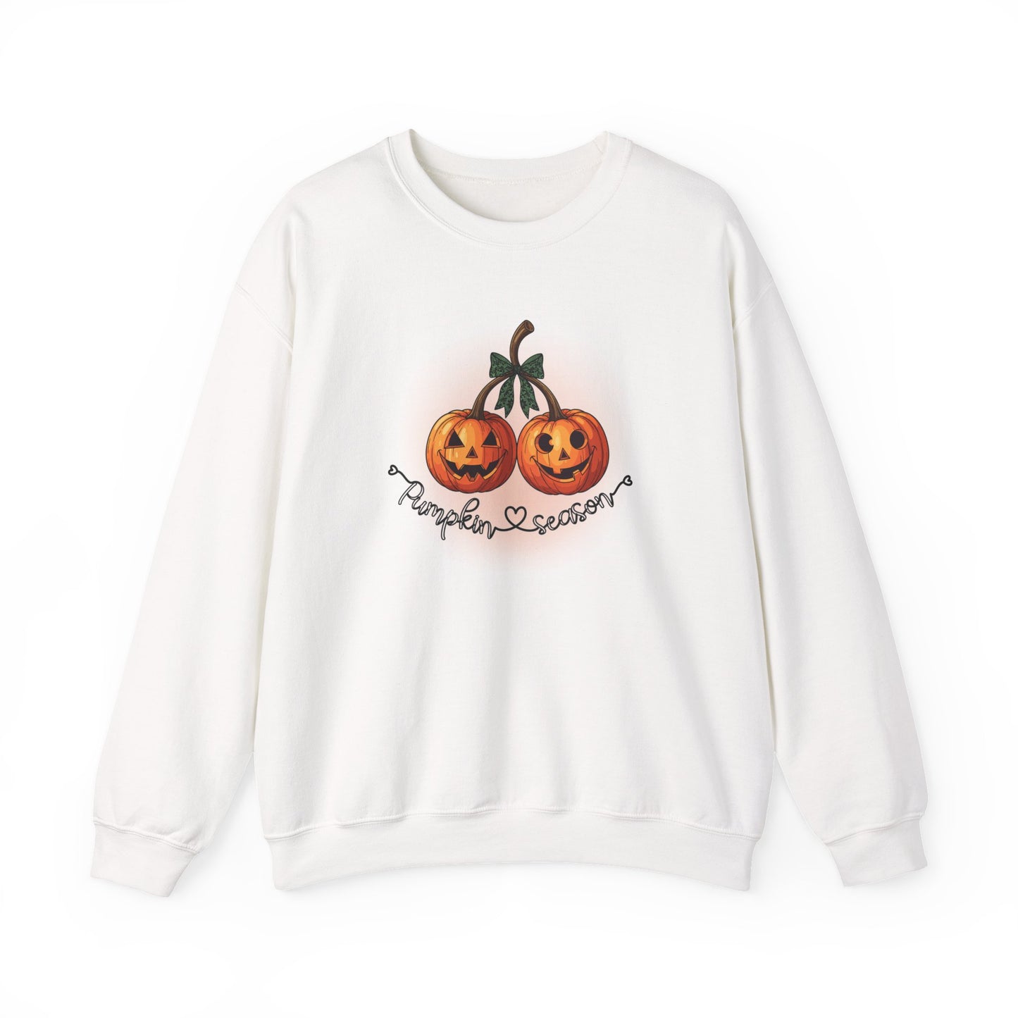 White sweatshirt with pumpkin design on a white background