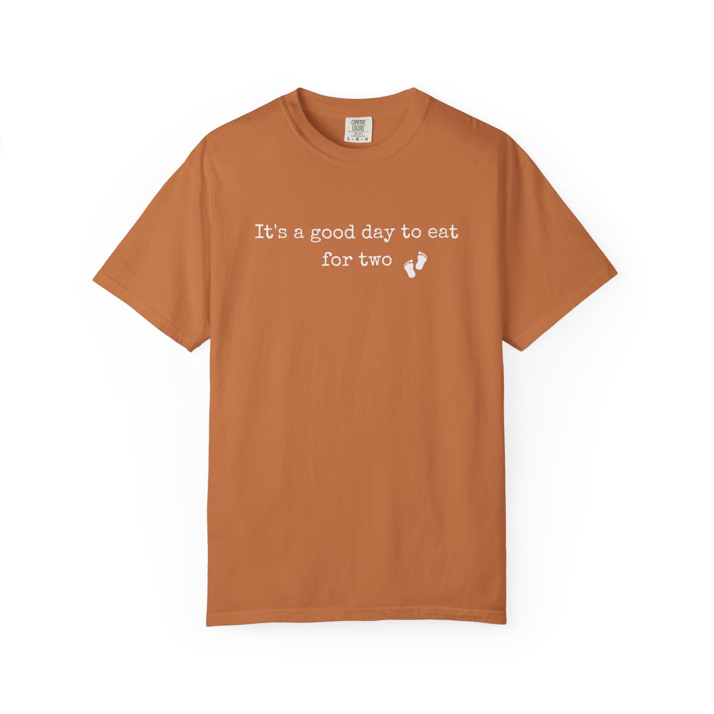 Brown t-shirt with white text on a white background