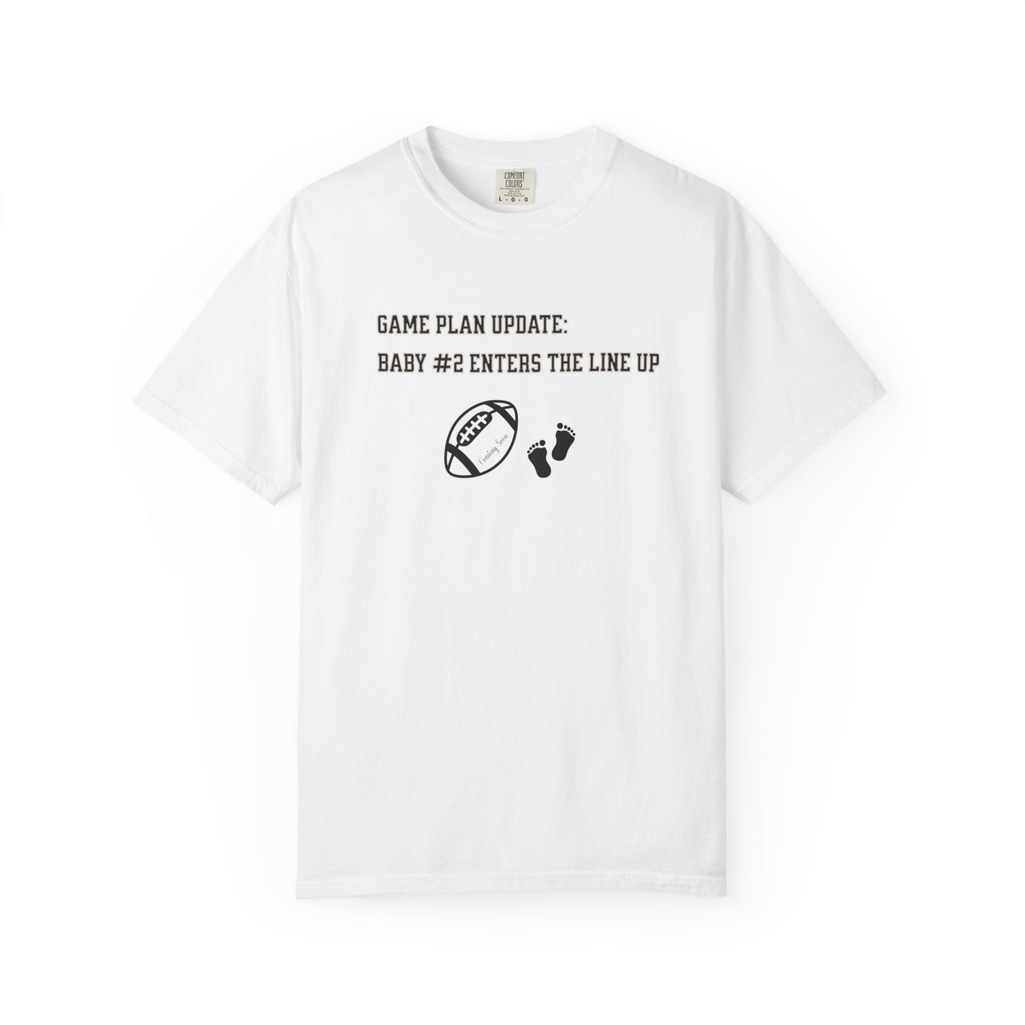 White t-shirt with black text and graphics on a white background