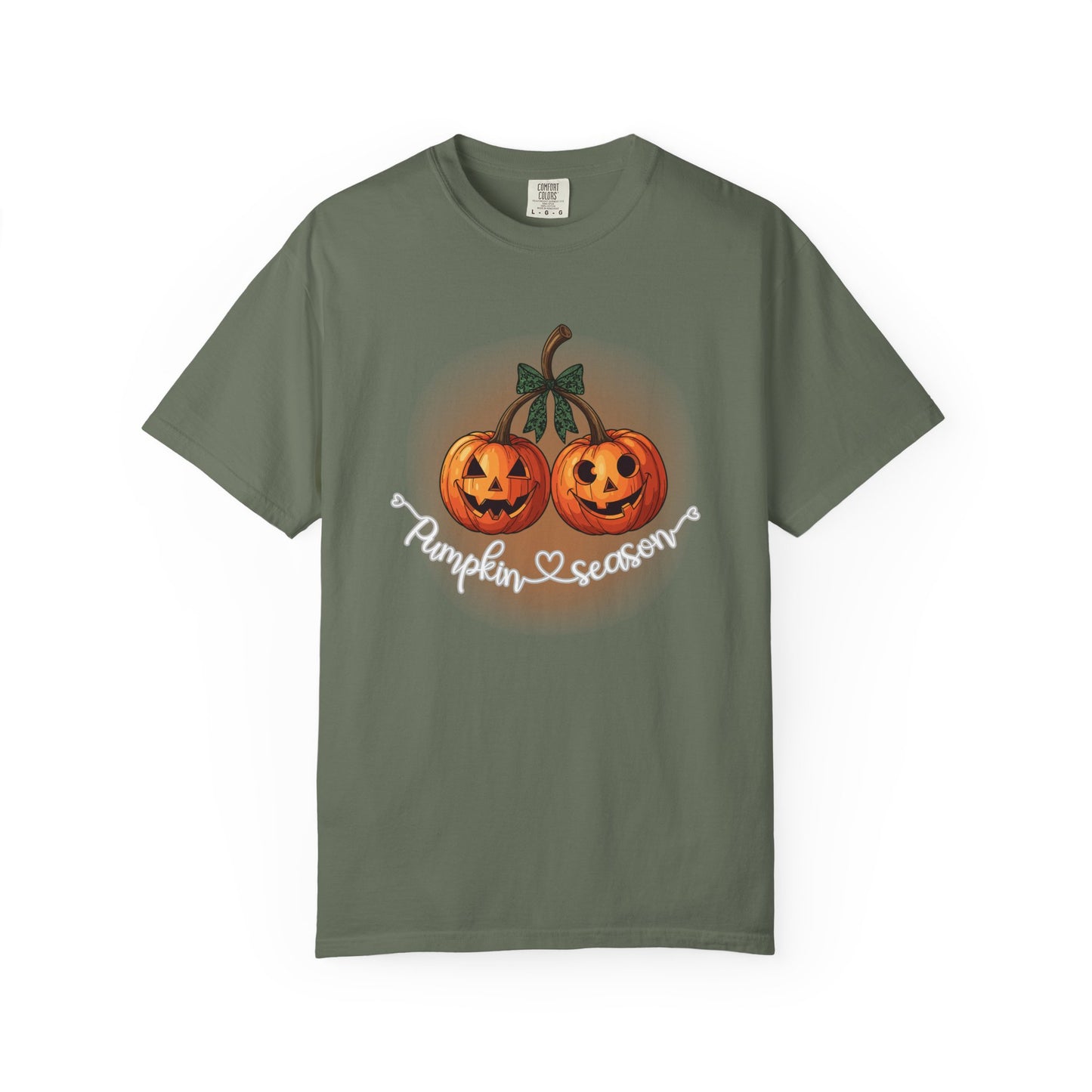 Green t-shirt with pumpkin design and 'Pumpkin Season' text on a white background