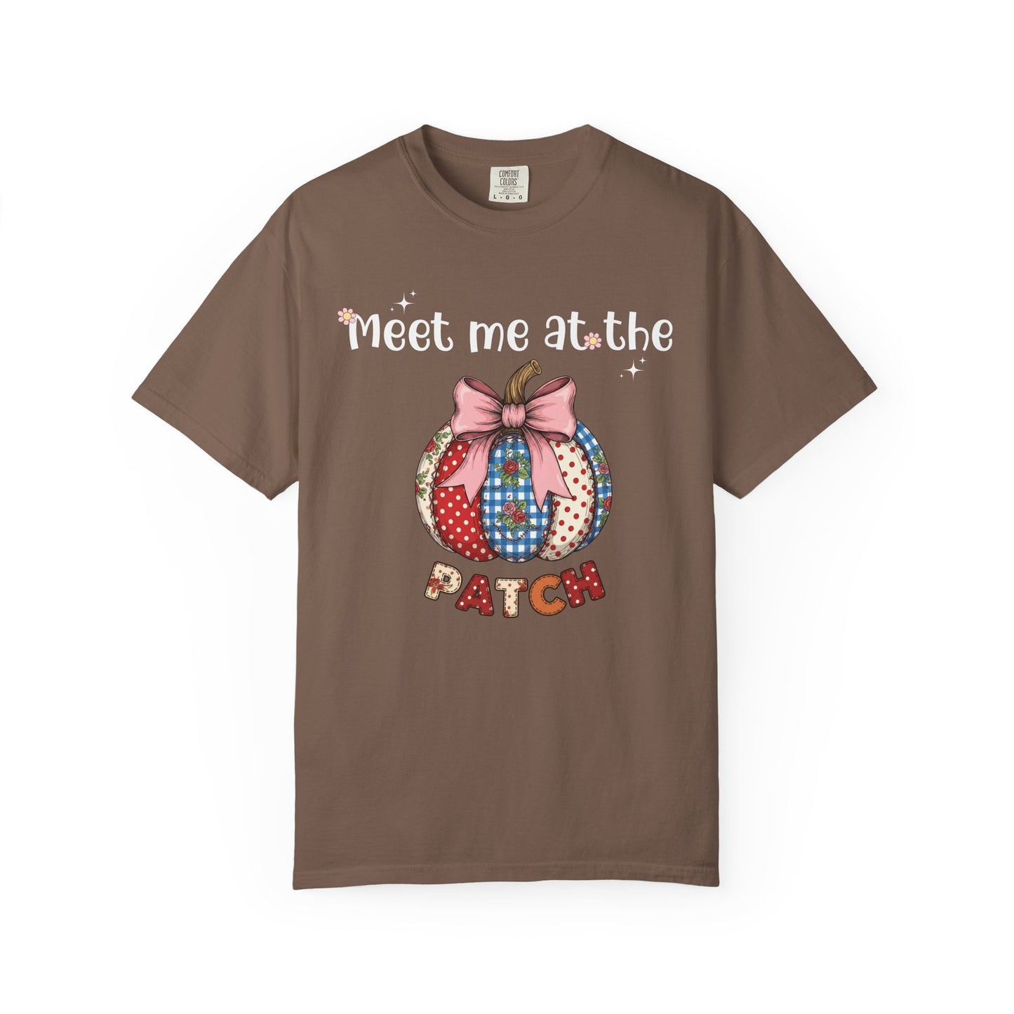 Brown t-shirt with a colorful patchwork design and text on a white background