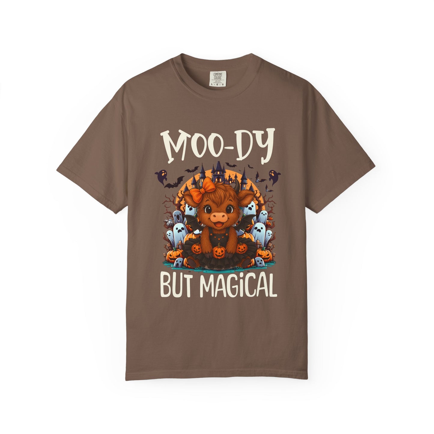 Brown t-shirt with a cartoon cow and text 'Moo-ly But Magical' on a white background