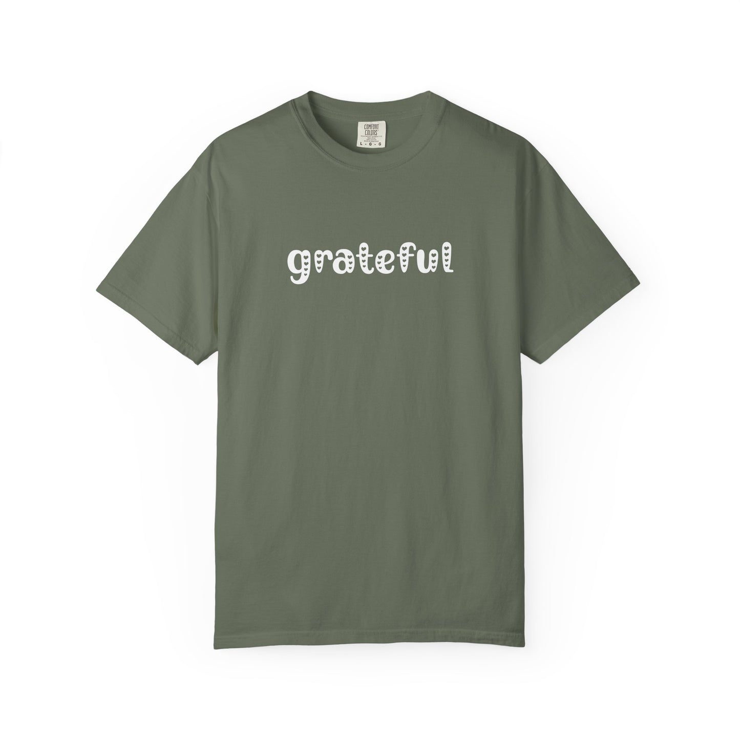 Green t-shirt with 'grateful' text on a white background