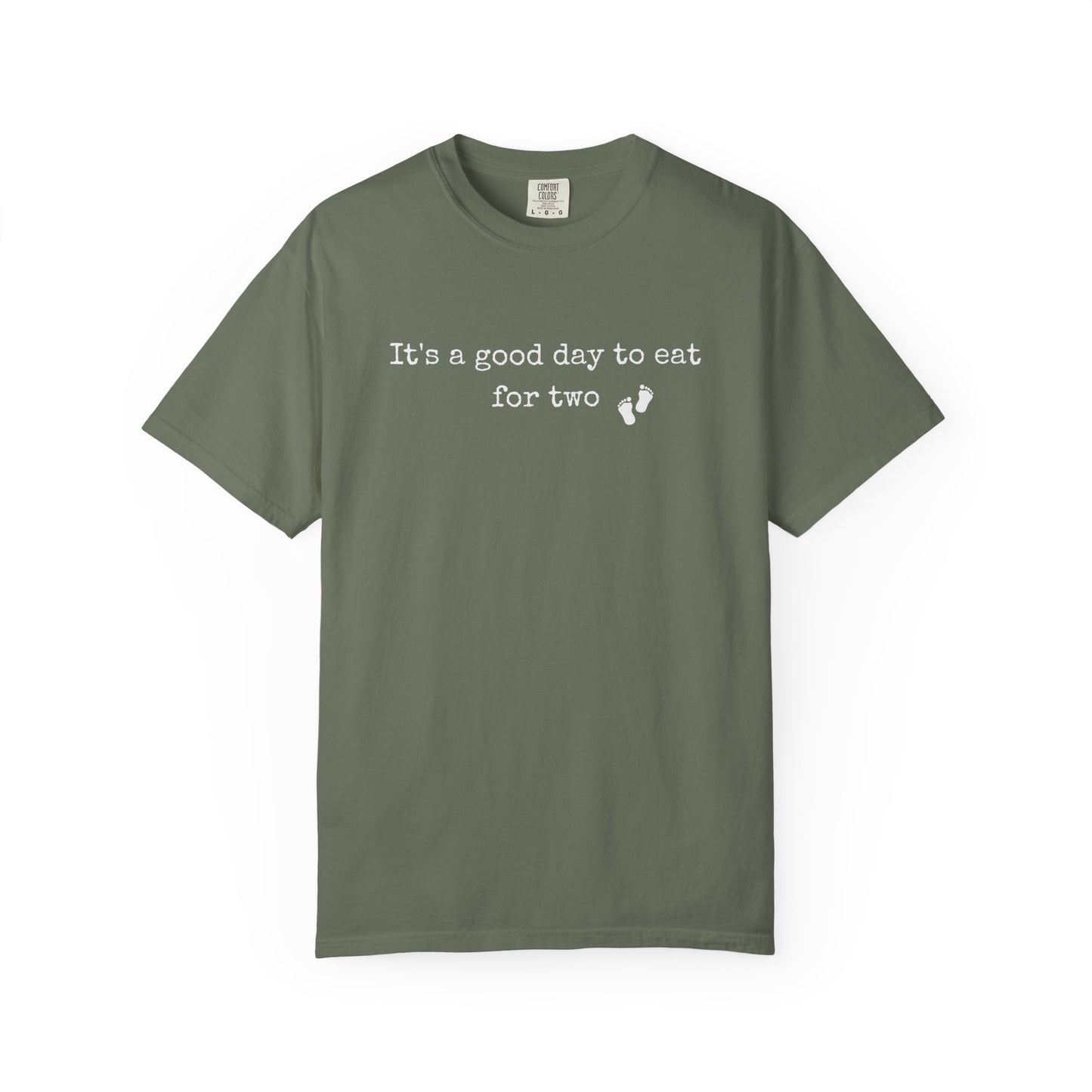 Green t-shirt with text 'It's a good day to eat for two' on a white background