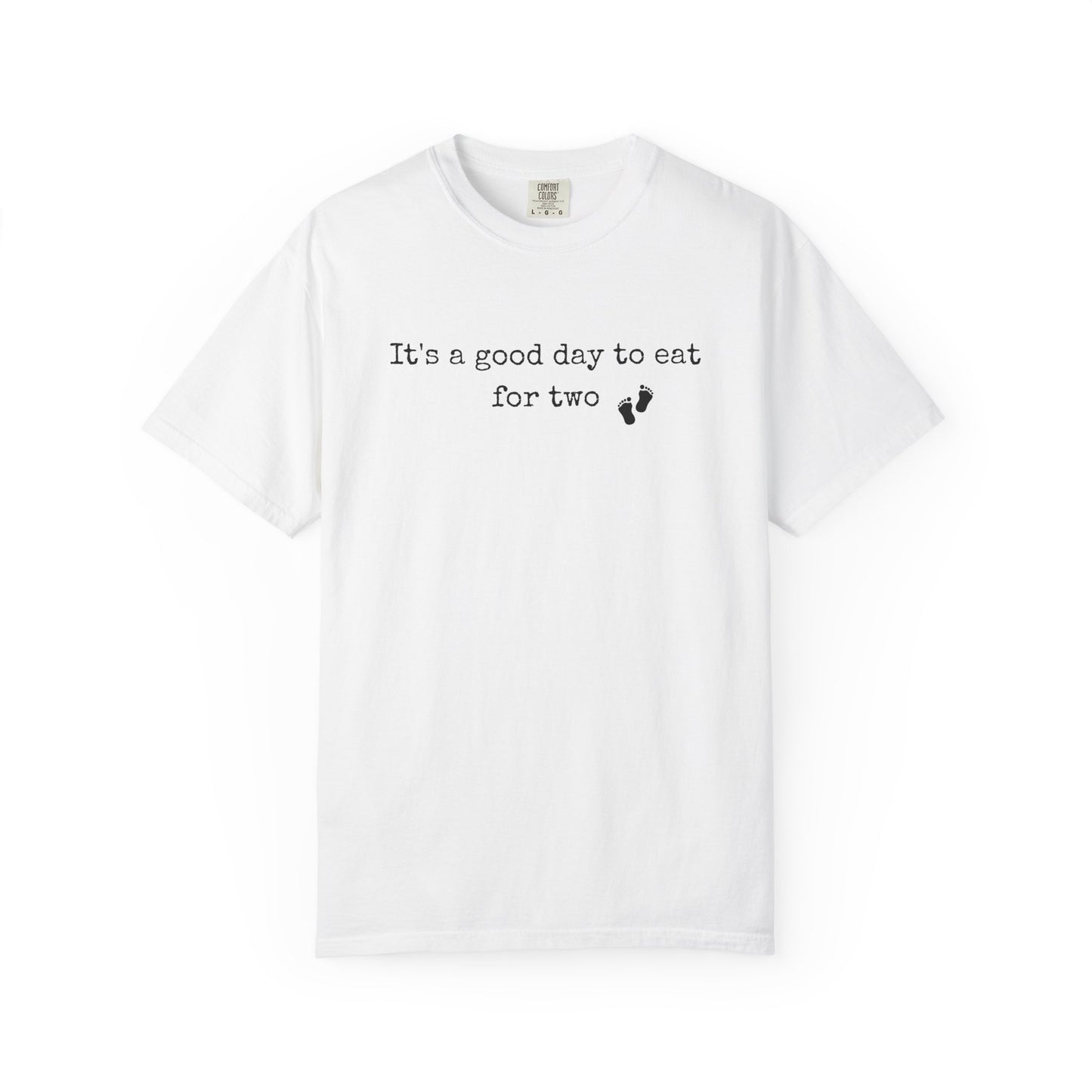 White t-shirt with text 'It's a good day to eat for two' on a white background