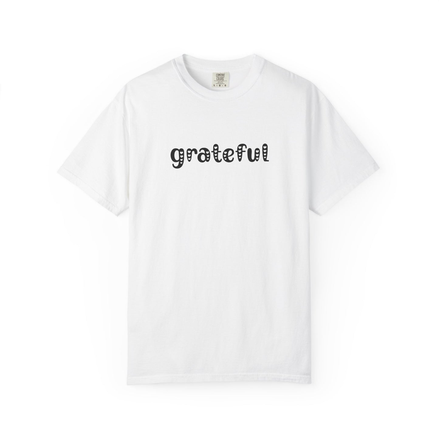 White t-shirt with 'grateful' text on a white background