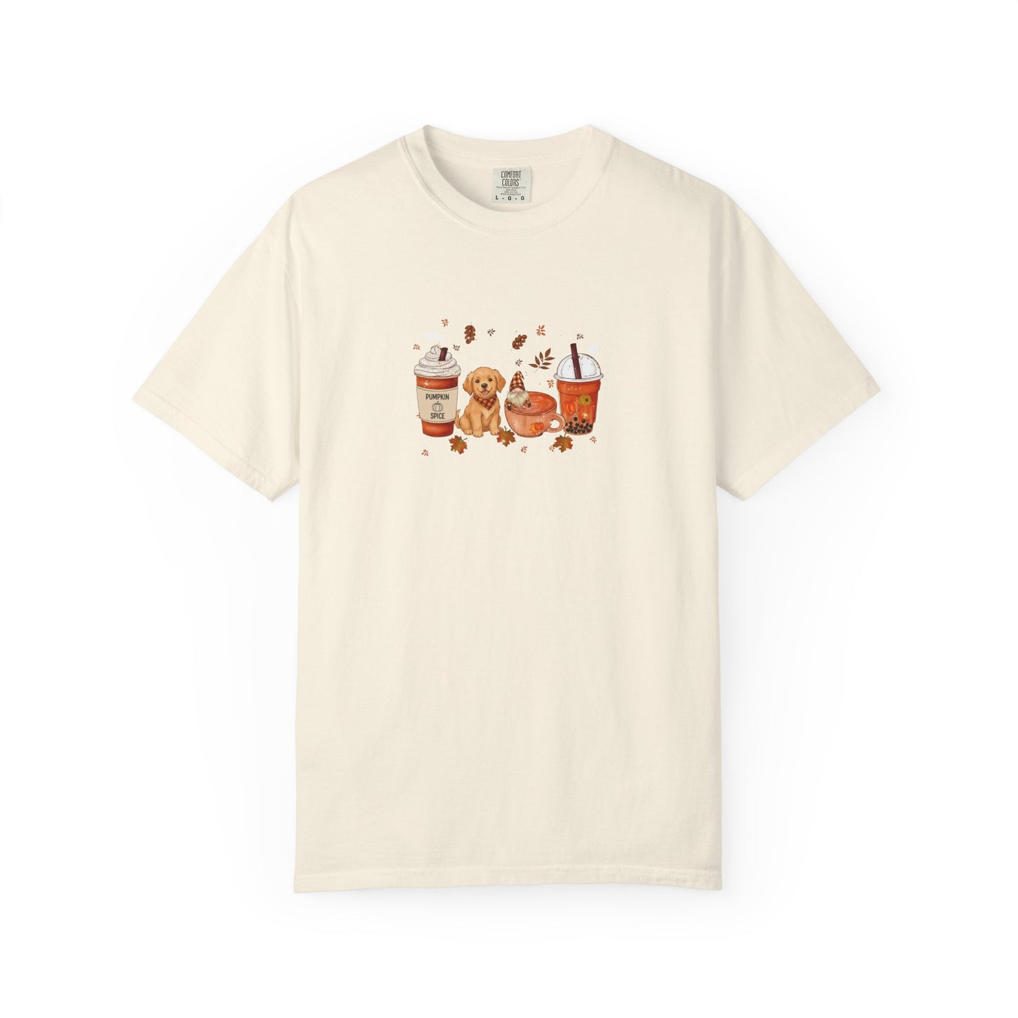 Beige t-shirt with a graphic design of a dog, coffee cups, and cookies on a white background