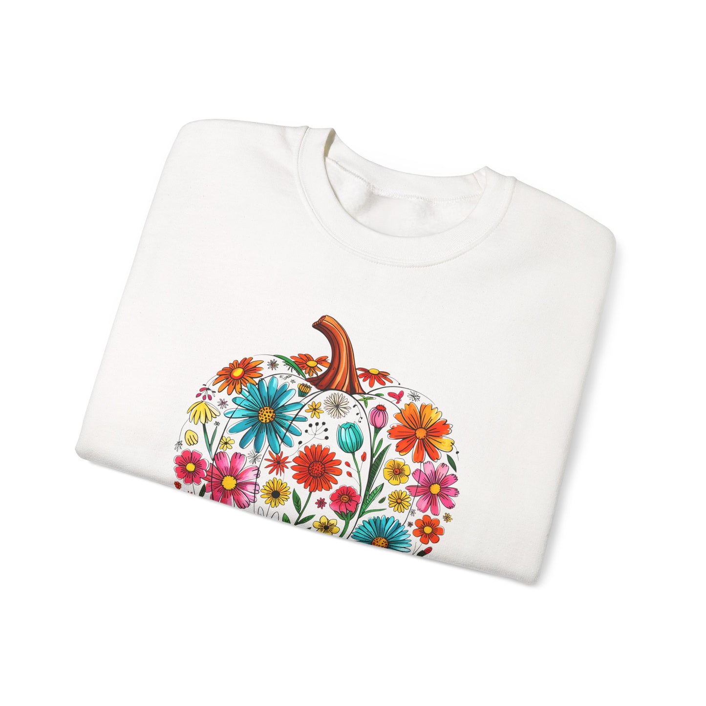 White shirt with a colorful floral pumpkin design on a white background