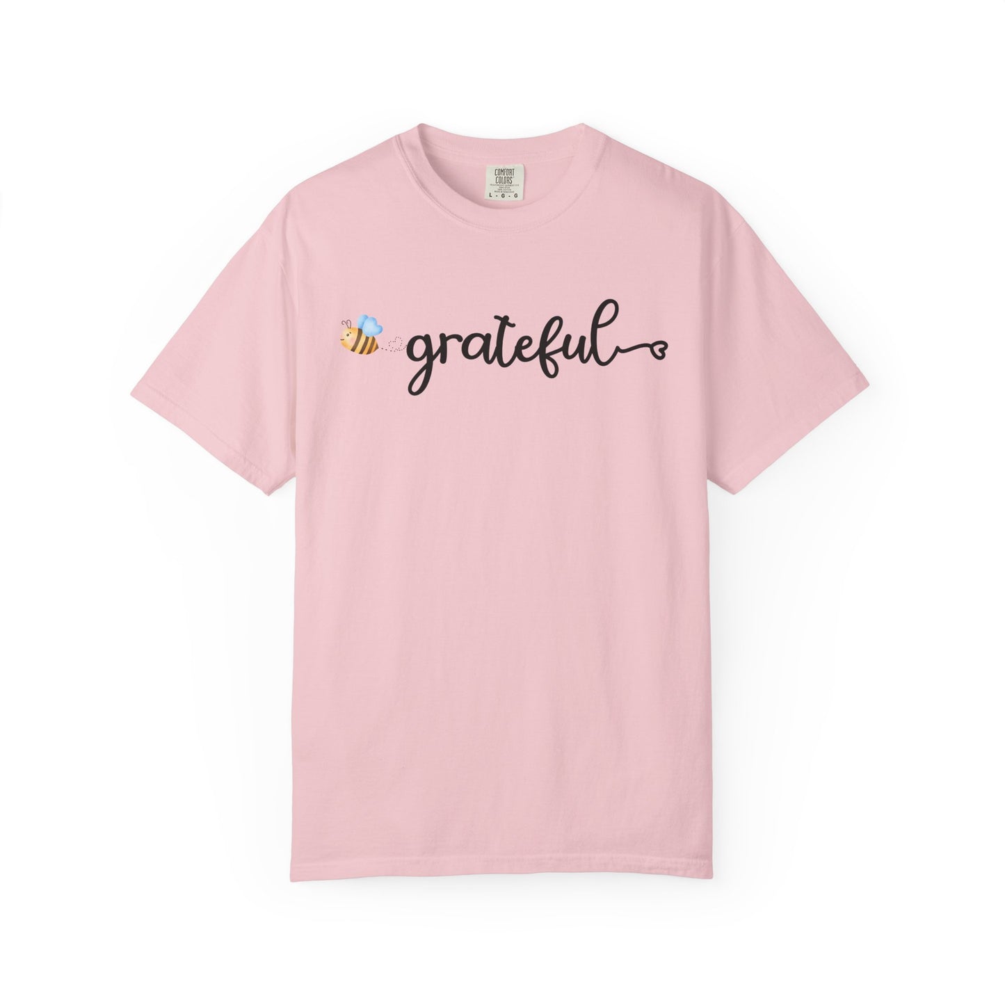 Pink t-shirt with 'grateful' text and bee design on a white background