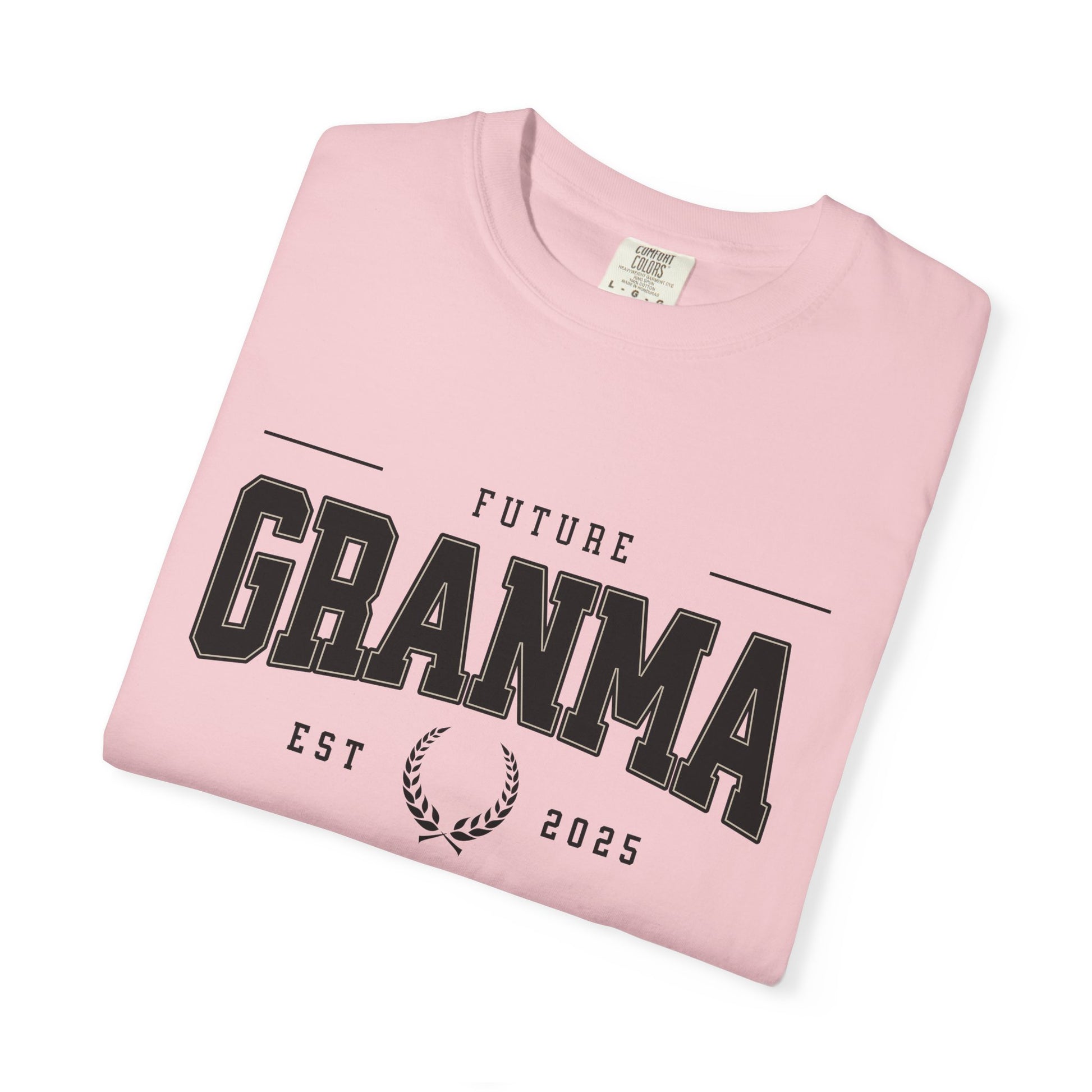 Pink t-shirt with 'Future Granma Est 2025' text on a white background