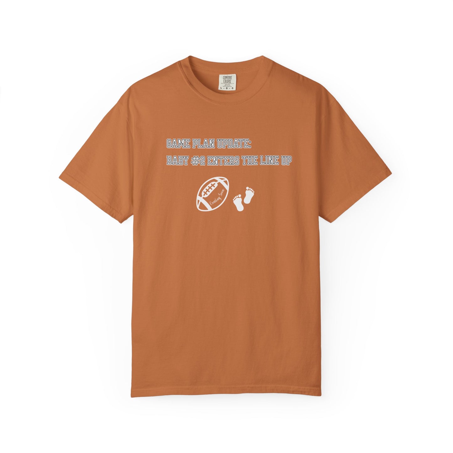 Brown t-shirt with white text and graphics on a white background