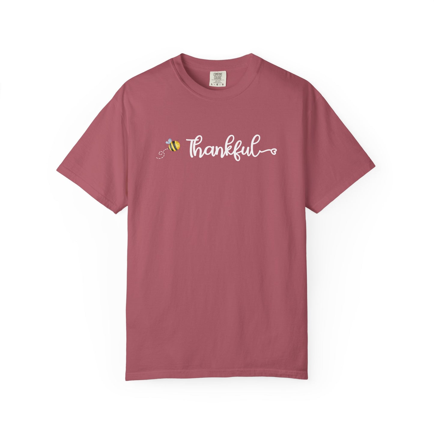 Mauve t-shirt with 'Thankful' text and bee graphic on a white background