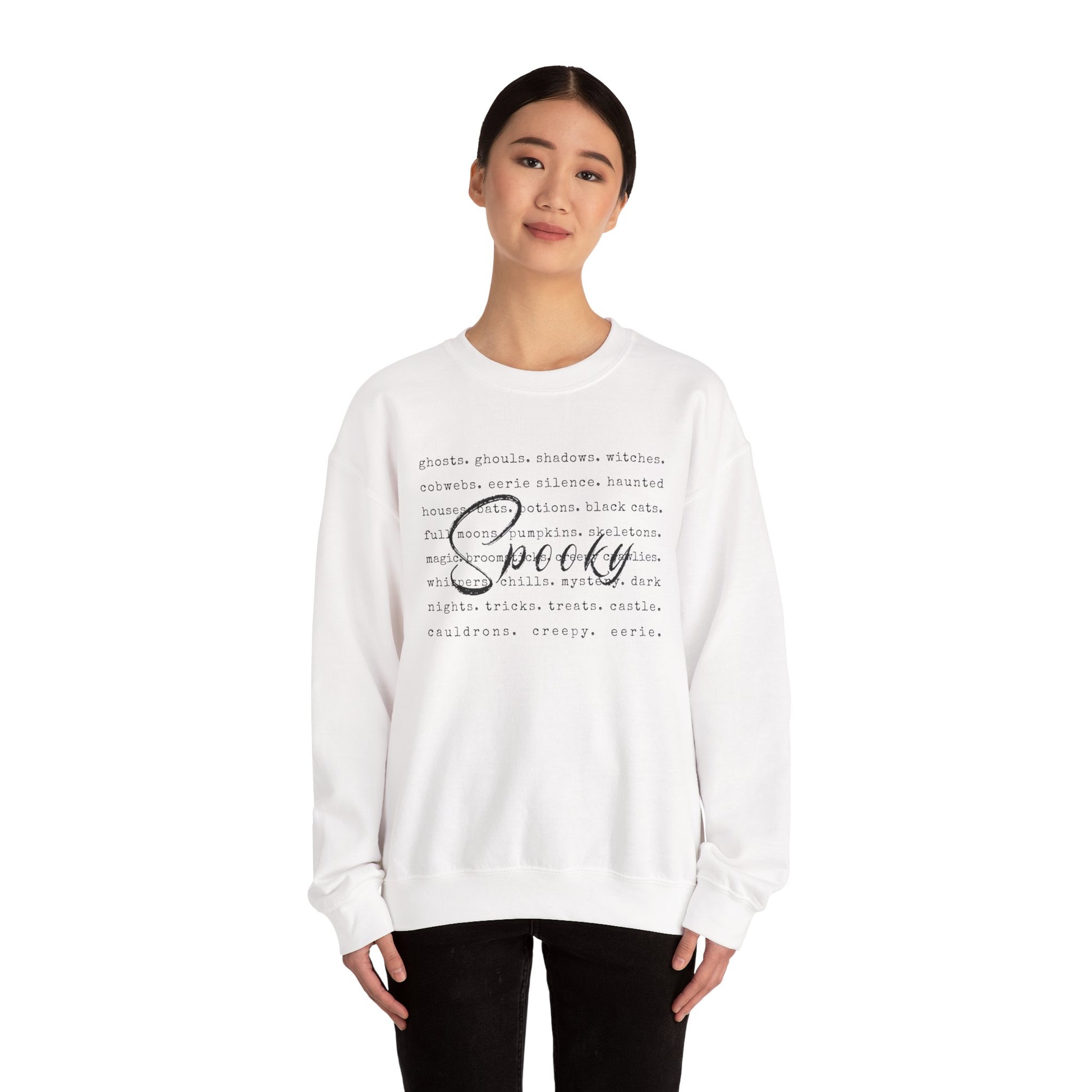 Person wearing a white sweatshirt with text design on a white background
