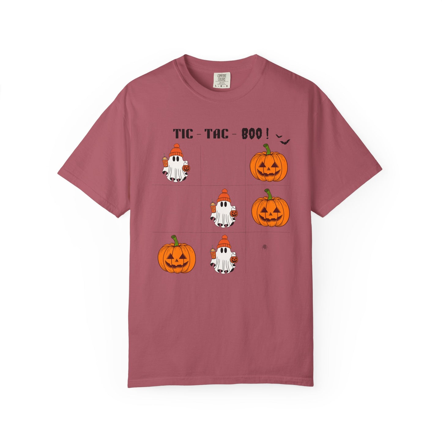 Pink t-shirt with Halloween-themed graphics and text on a white background