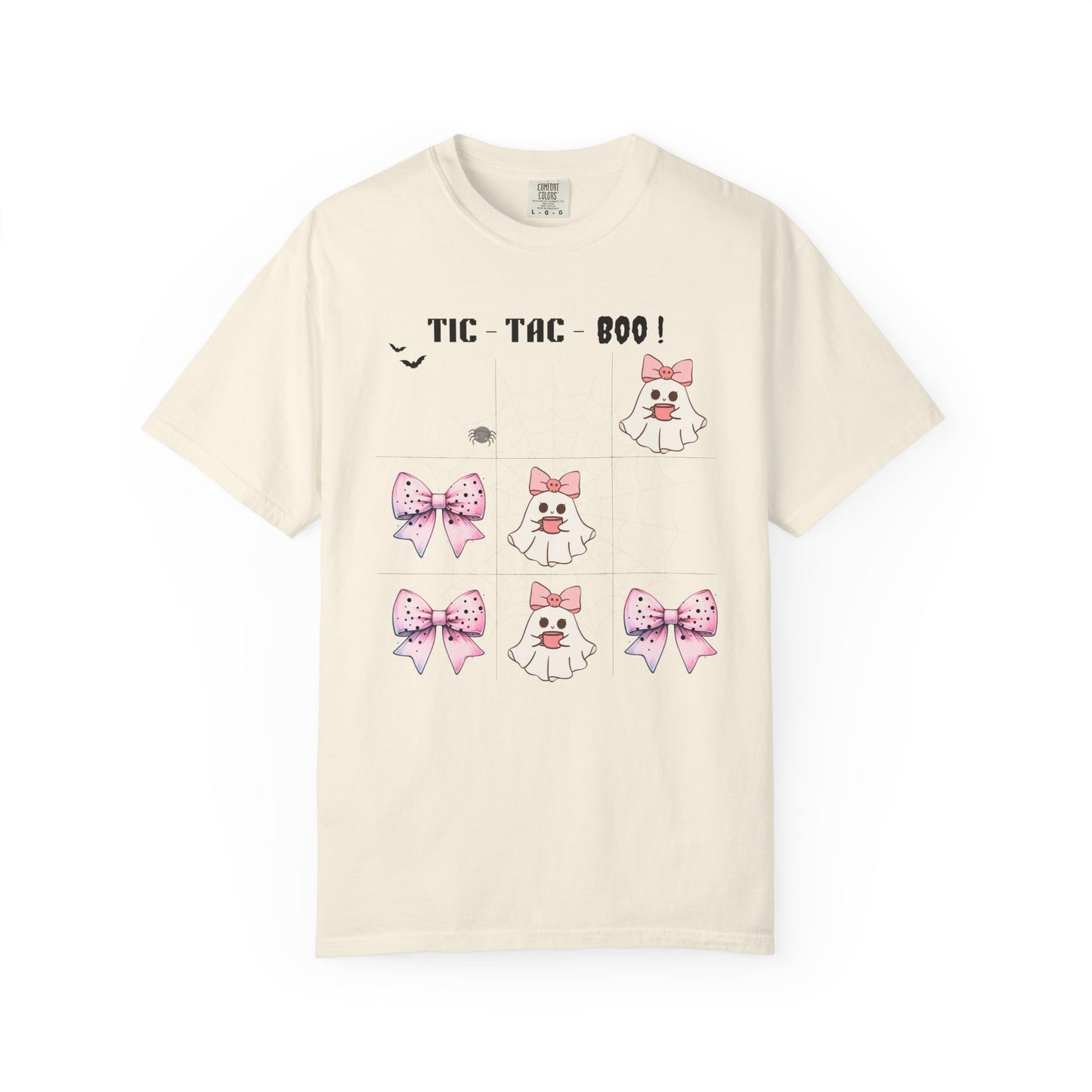 Beige t-shirt with graphic design featuring ghosts and bows on a white background