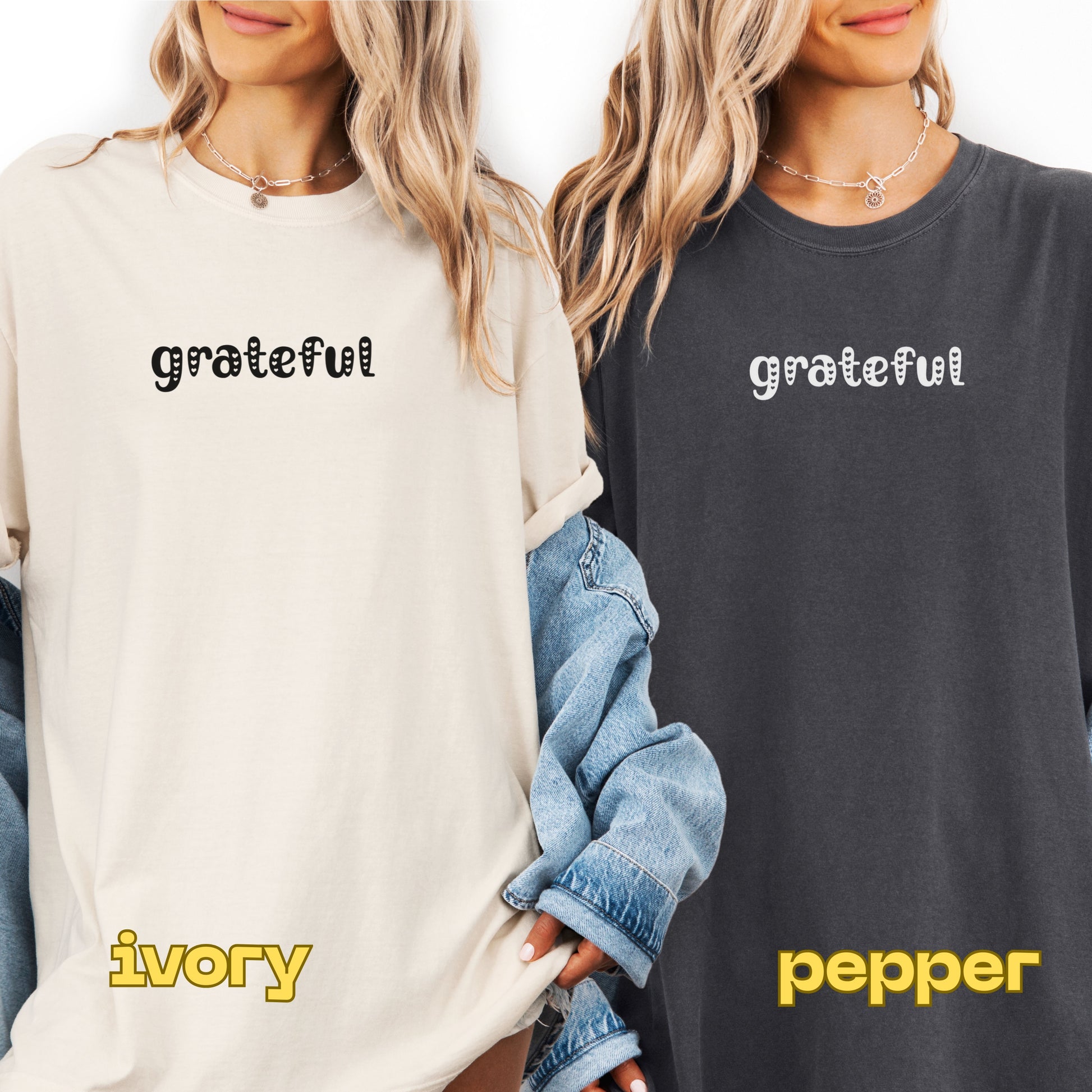 Two people wearing sweatshirts with 'grateful' text, one in ivory and one in pepper color, holding denim jackets.