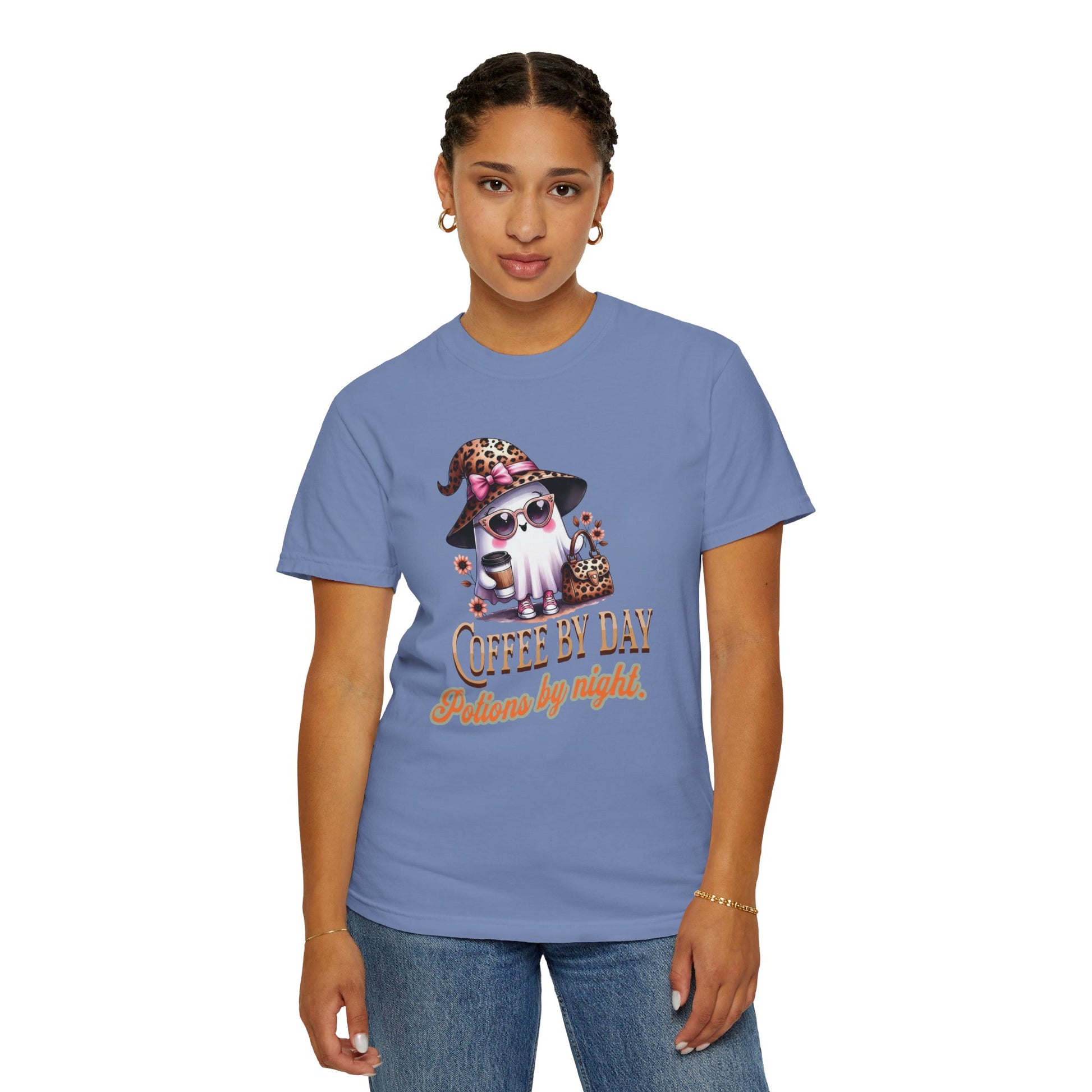 Person wearing a blue t-shirt with a graphic design of a dog and text on a white background
