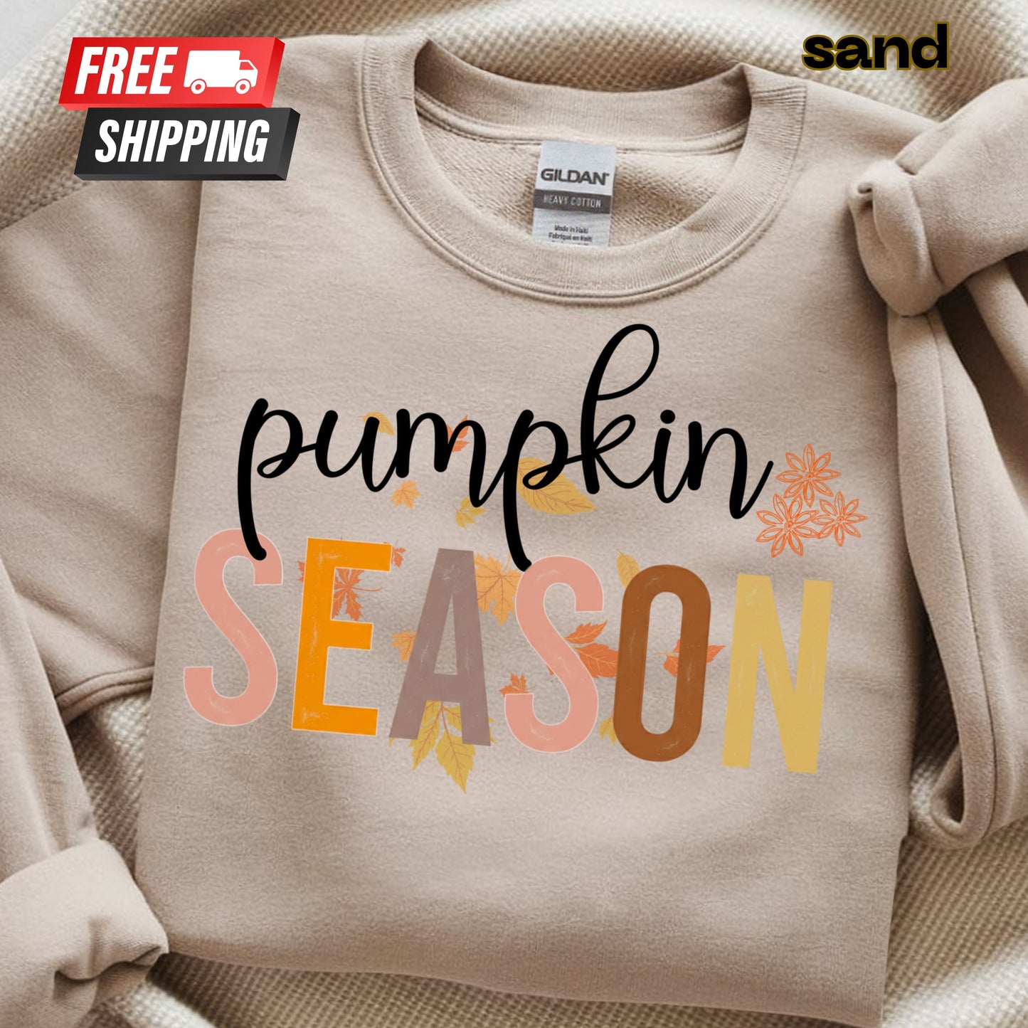 Beige sweatshirt with 'pumpkin season' text and fall-themed design on a beige background