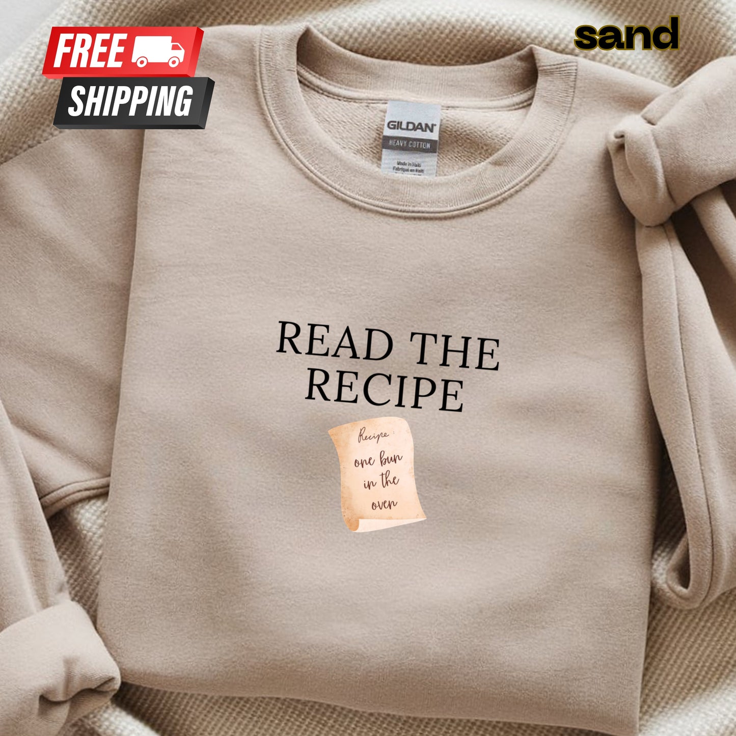 Beige sweatshirt with 'Read the Recipe' text and a tag on a beige background